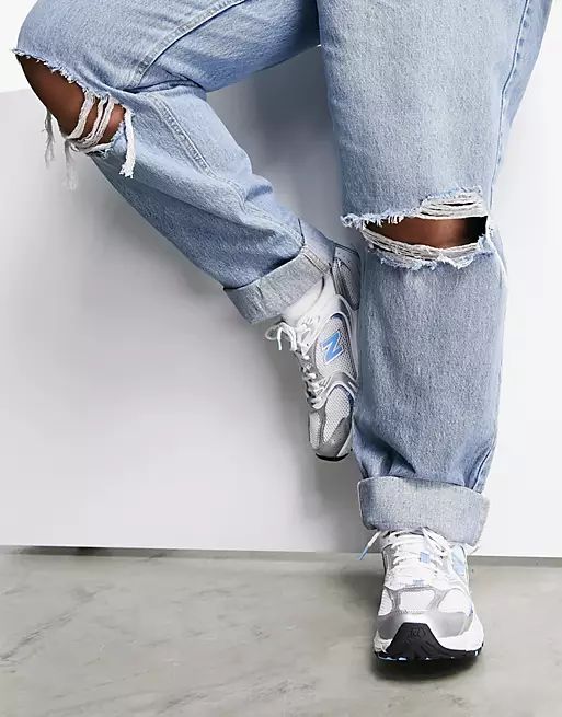 ASOS DESIGN Curve high rise 'slouchy' mom jeans in stonewash with rips | ASOS (Global)
