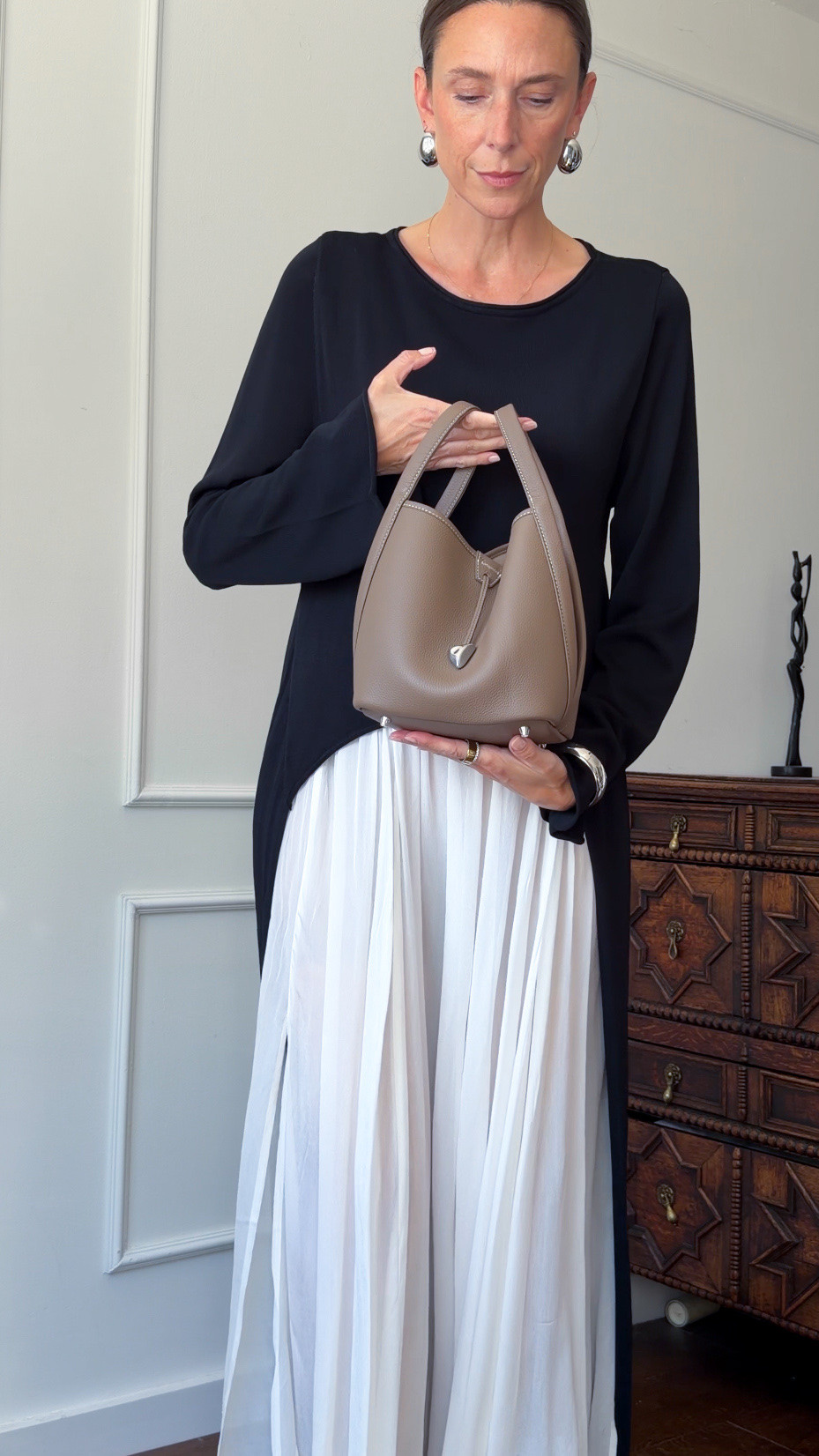 Bag is Songmont. 

Summer outfits, late summer outfits, white skirt, long-line knit, white summer dress, pretty top.

#LTKuk #LTKsummer #LTKstyletip