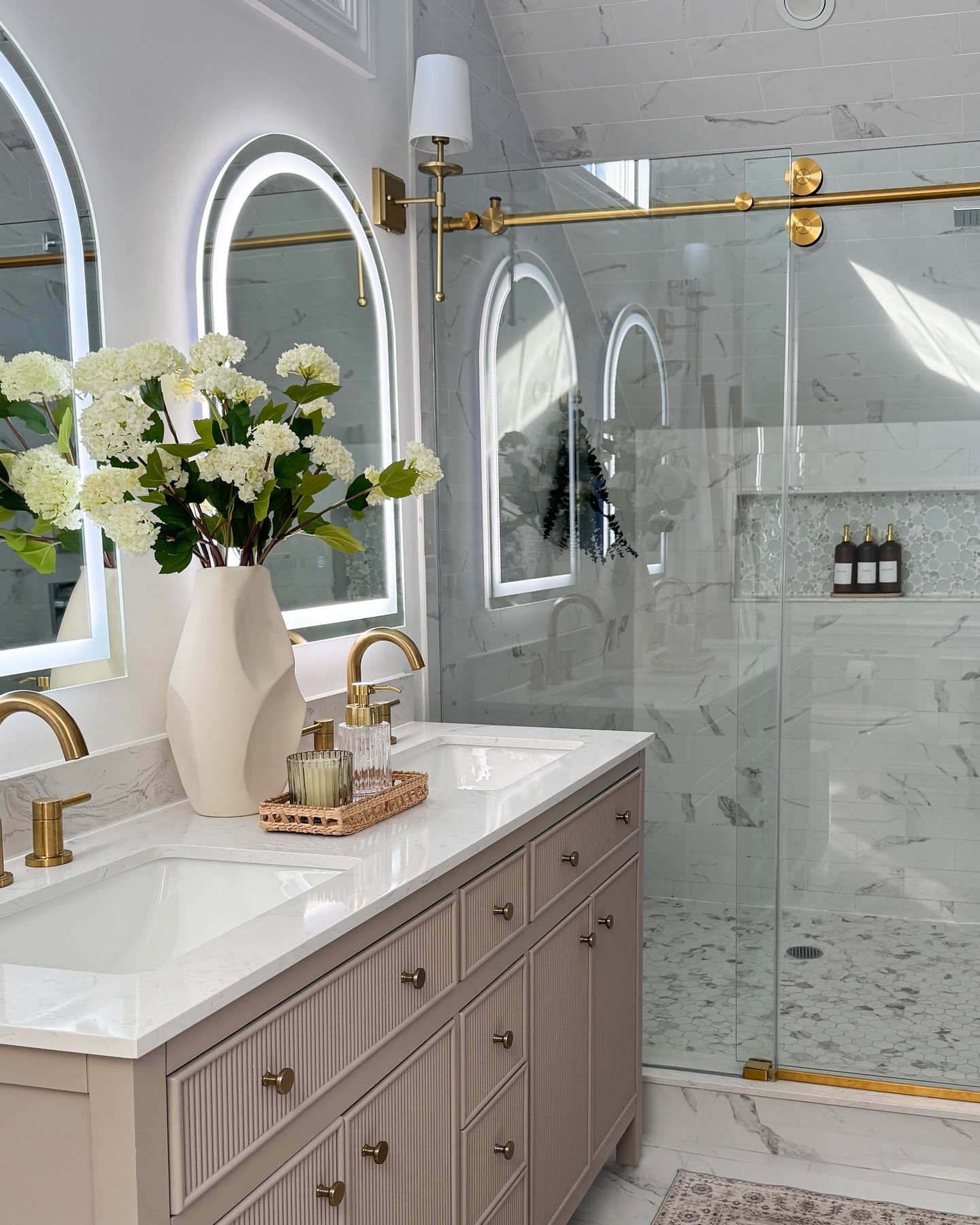 Sharing some stills for those who love to take in the details ✨ I still can’t get over how much of a difference this @vigoindustries frameless shower door made in our bathroom. It instantly made the space feel more open, bright, and modern while still keeping that timeless feel I love. The sleek glass, minimal hardware, and clean lines pull everything together in the best way! 


.
.
.
#Ad #BathroomRefresh #VigoIndustries #ModernBathroom #VIGOeveryday #VIGOindustries #showerdoor #bathroomdesign

#LTKStyleTip #LTKHome #LTKWatchNow