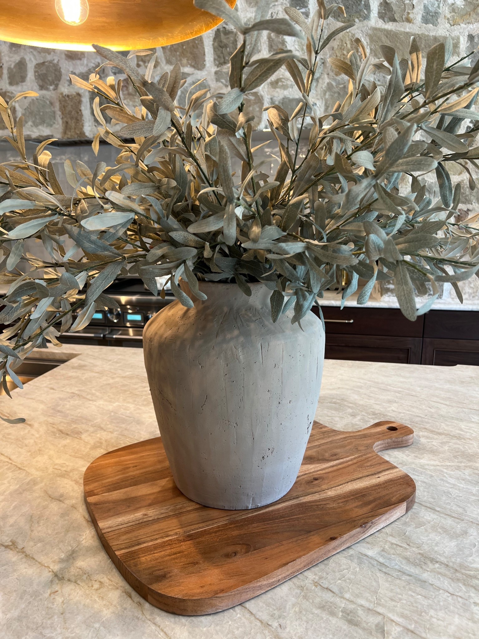 Love this simple arrangement that will elevate any space. 
The vase is the LARGE Textured Adrienne Vase. I used the fading olive branch stems in this vase. Cutting board is from Home Goods 

#LTKHome #LTKFindsUnder100 #LTKFindsUnder50
