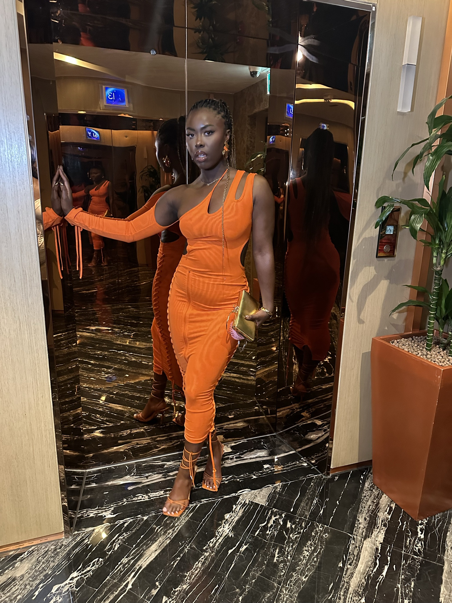 Orange cut out body-con mesh dress for night out | styling an orange dress | gold accessories 

#LTKparties #LTKstyletip