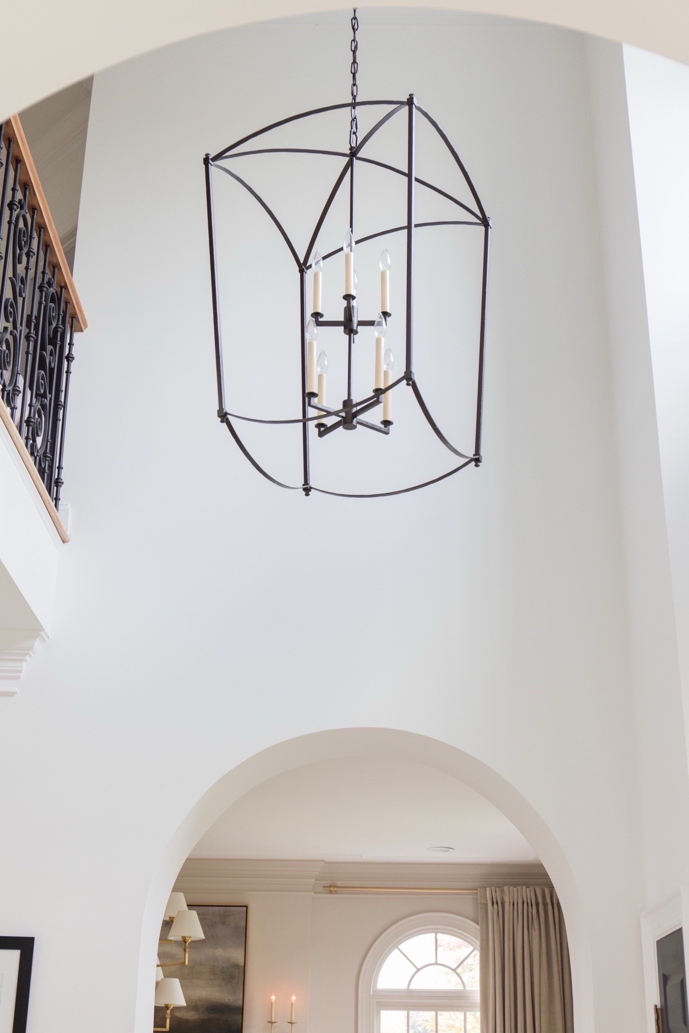 This entryway chandelier makes the space! Home | Home Decor | Home Finds | Modern Home | Neutral Home | Neutral Style | Arched Manor | Wayfair Home | Wayfair Lighting | Entryway Chandelier | Entryway | Wayfair Pillows | Lighting | #homedecor #archedmanor #modernhome #neutralstyle 
#LTKSeasonal #LTKHome