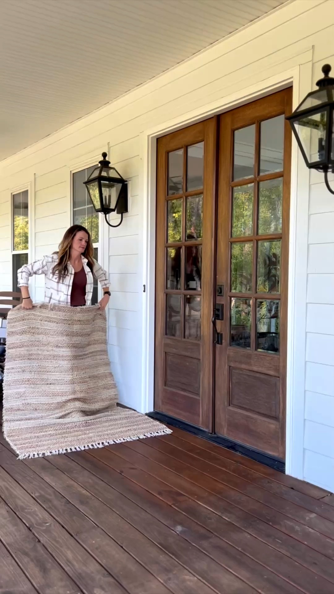 I asked you guys to rank my fall front porches and this one came in number three! I loved using nontraditional colors and this red/burgundy is so beautiful for fall. I’m thinking about using it again this year. The magnolia trees are such a statement maker by my front doors and I’ve linked several resin pumpkin options for you if you don’t wanna deal with the real thing. ￼ also on the wreaths, the backside of the leaves are red, so I just turned some of them around to match the trees! ￼

#LTKSeasonal #LTKHome #LTKSaleAlert