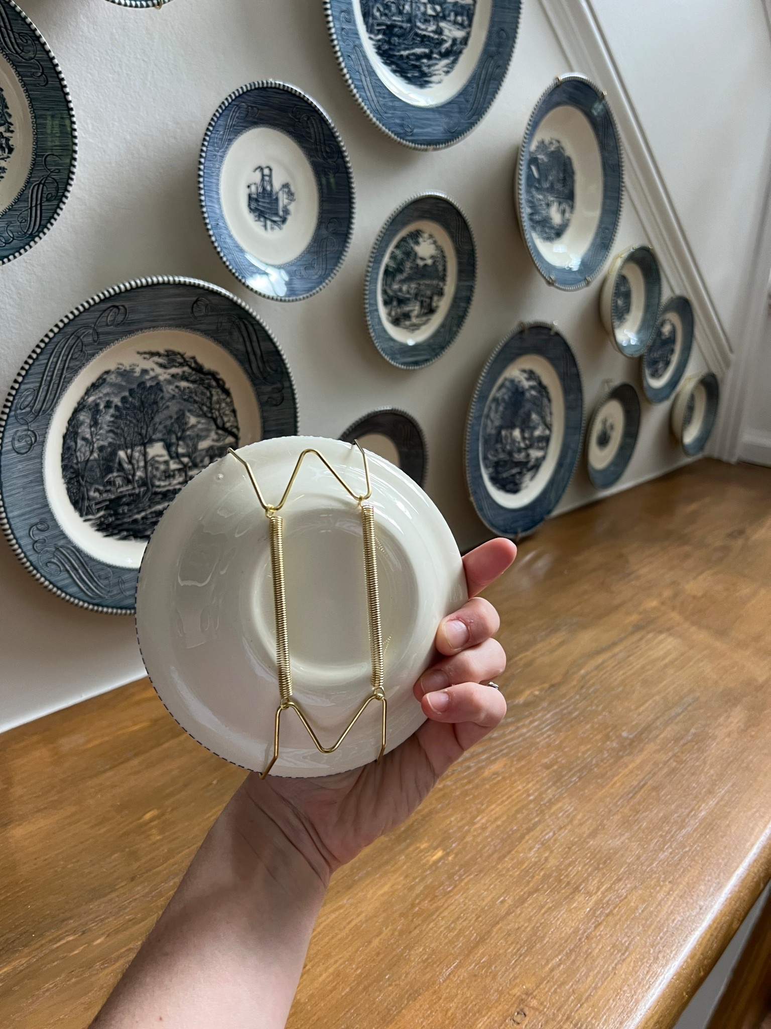 Wire plate hangers, the best! I won’t use the sticky kind anymore 

#LTKHome