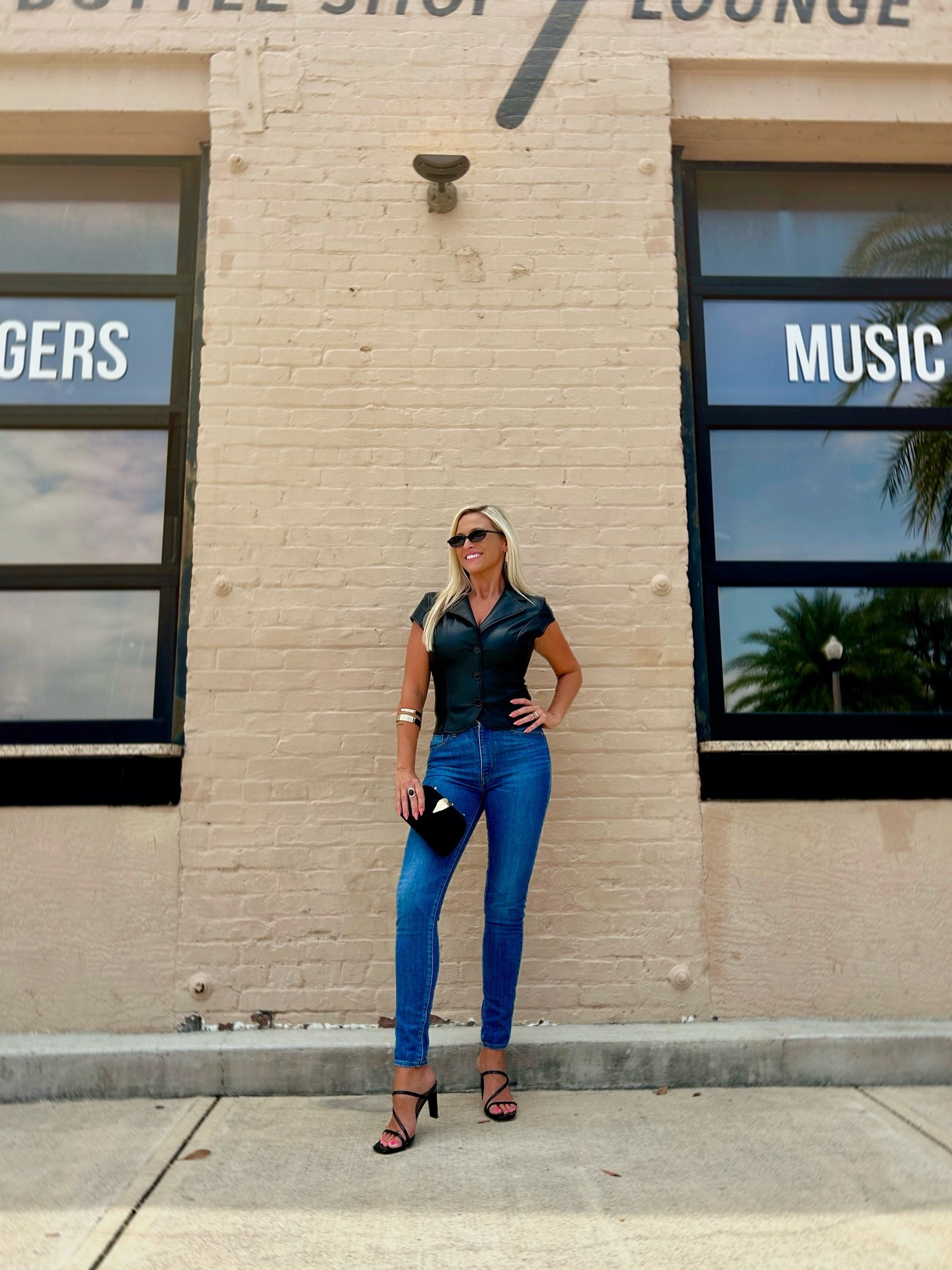 Serving sleek, edgy, and a little badass 🖤😎 Fitted @levis denim, @dolcevita strappy heels, @amazonfashion cool shades and handbag, and the @urbanoutfitters leather top that pulls the whole vibe together. This look was made for rooftop nights and concert lights!

#LTKootd #LTKU #LTKgrwm