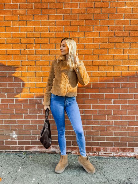 Styling fall faux fur jacket with skinny jeans, UGG Neumel, and Melie Bianco bag.

Fall outfit, casual Sunday style, Ugg boots 

#LTKshoecrush #LTKSeasonal #LTKstyletip