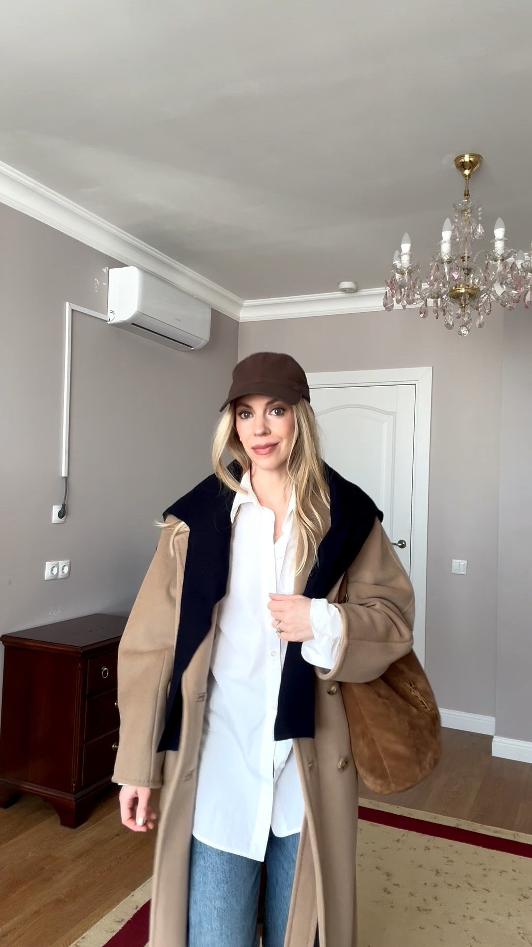 Travel look, airport outfit, camel coat, white button down shirt with jeans, @Zara leather loafers, YSL suede bucket bag, CBK style 

#LTKTravel #LTKOver40 #LTKspring