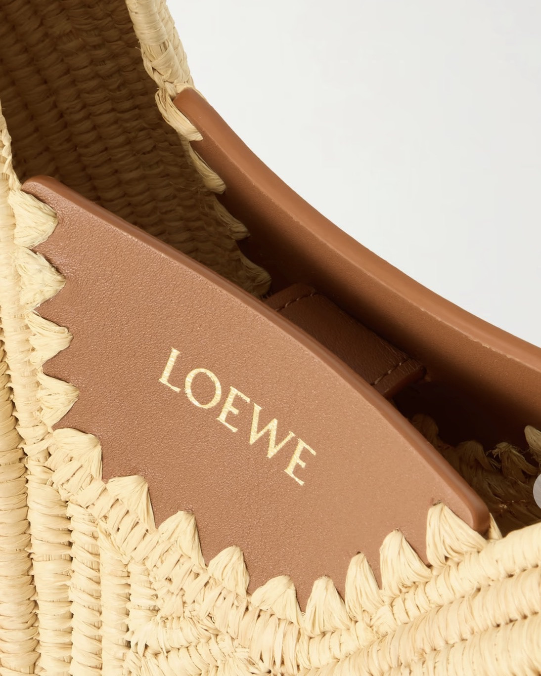 LOEWE
+ Paula's Ibiza Swing medium leather-trimmed raffia shoulder bag

Reprising its collaboration with Paula’s Ibiza, Loewe’s 'Swing' bag is defined by its sculptural, crescent-like shape. Woven from raffia with leather trims, it’s designed to sit comfortably on the shoulder

#LTKSeasonal #LTKWorkwear #LTKTravel