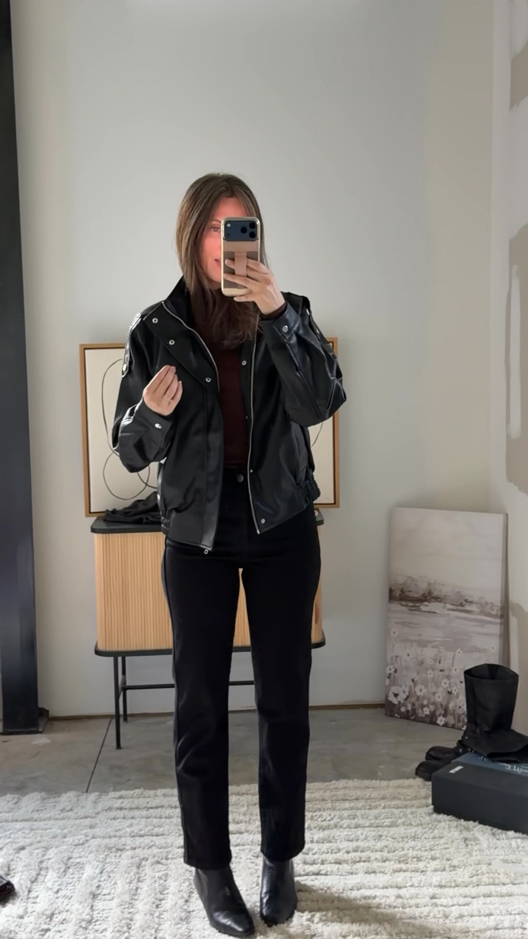 Wearing the small faux leather jacket