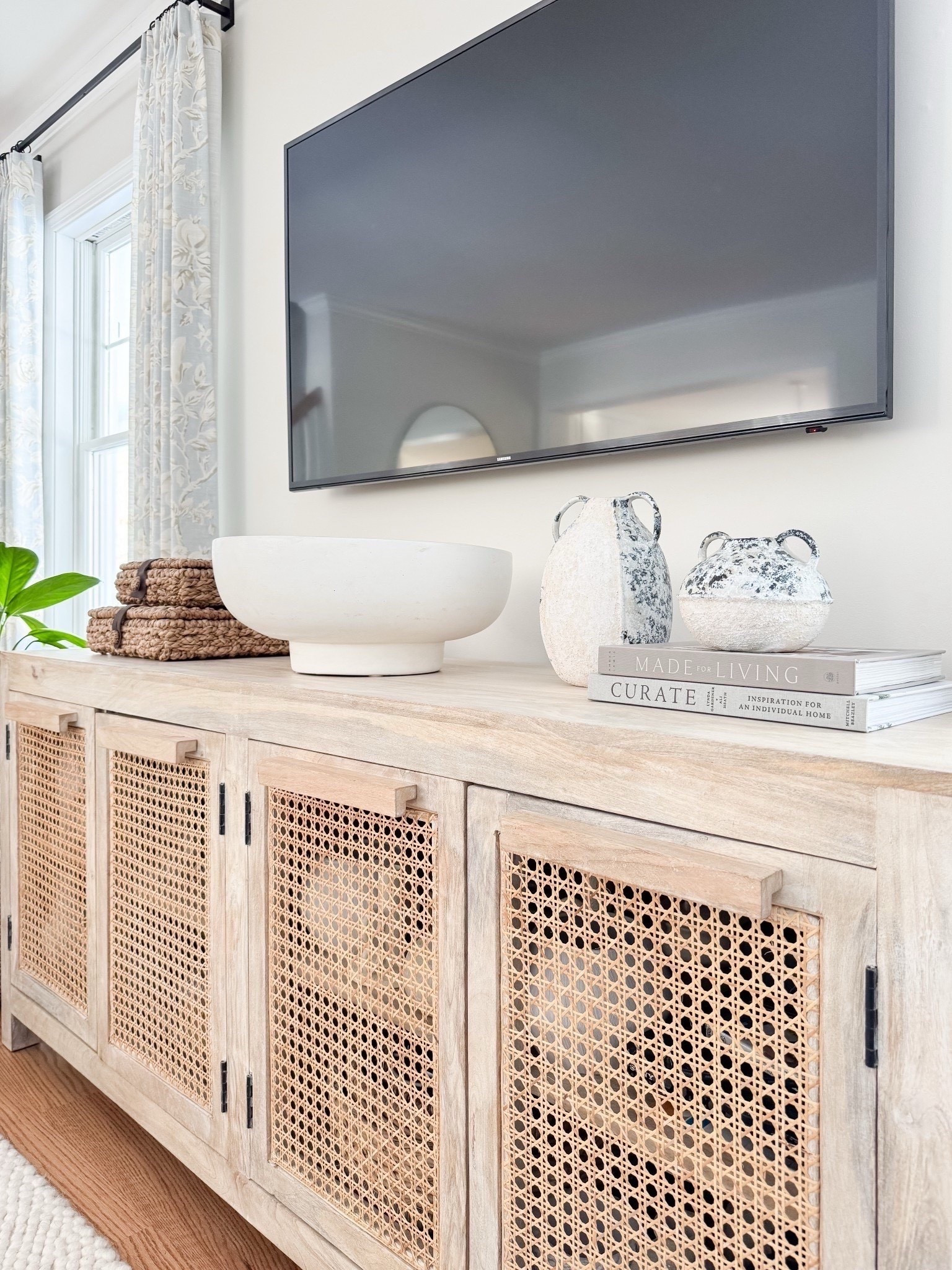 Media console finds I love! 🤍 This piece of furniture strikes the perfect balance between statement making and neutral, and it’s a pretty base to add decorative elements on top of. Speaking of—this white terracotta bowl is on sale right now (and it’s always bestseller!) 

#LTKHome #LTKSaleAlert