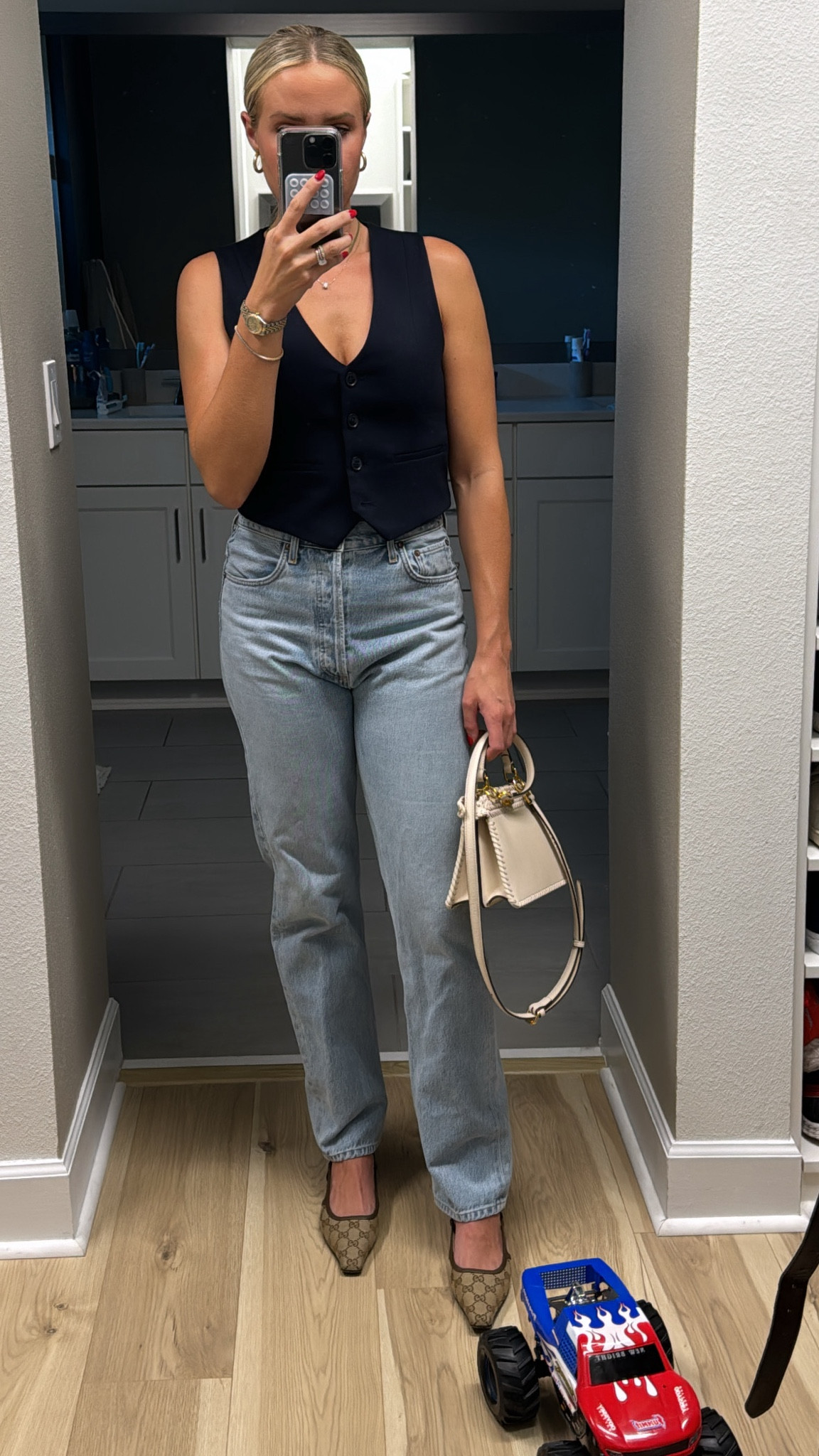 Agolde jeans - navy vest - Gucci slingbacks - family photos - night out 

#LTKHoliday #LTKGiftGuide #LTKFamily