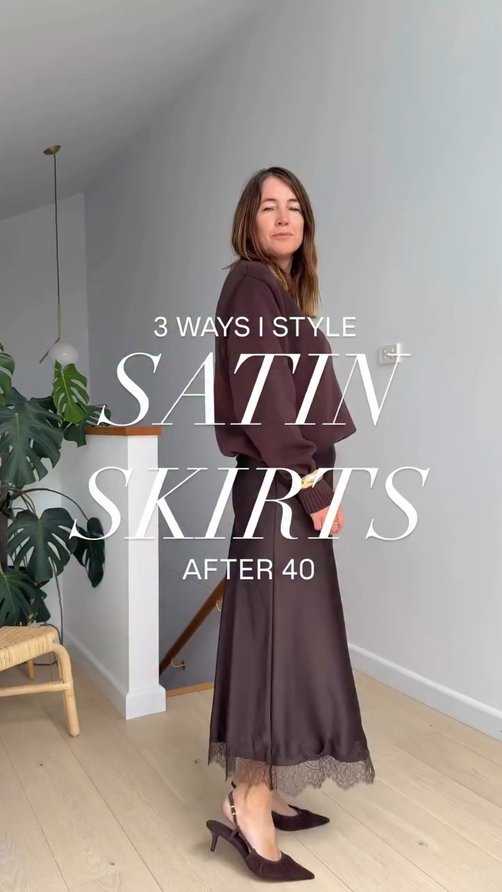 3 ways I style satin skirts after 40 🤎

The satin skirt is one of those pieces that works far beyond evening wear. Styled the right way, it becomes a modern, elevated staple that moves easily between casual and polished looks.

LOOK 1.
A full tonal moment in chocolate brown. The brown satin skirt with lace trim layered with a brown cotton knit jumper and finished with suede kitten heels. Texture on texture makes tonal dressing feel rich and interesting rather than flat.

LOOK 2.
A more relaxed take. Burgundy satin skirt with burgundy sneakers and a black leather jacket for contrast and edge. This is my favourite way to make a feminine piece feel cool and modern - balancing soft fabrics with strong layers.

LOOK 3.
Another tonal look, this time in white and off-white. A long satin skirt styled with a linen bomber featuring a funnel neck (the neckline of the season). Finished with snake print pointed flats for just a hint of print and personality.

Satin skirts are such a versatile wardrobe piece, perfect for layering, playing with texture and creating modern outfits that feel effortless but intentional.

Which look would you wear: chocolate, burgundy or white?

See stories for outfit links 🔗 

Follow along for modern style with edge for women 40+ who refuse to dress boring 🖤

#over40style #styleover40 #satinskirt #fashionover40 #dailyoutfitinspo