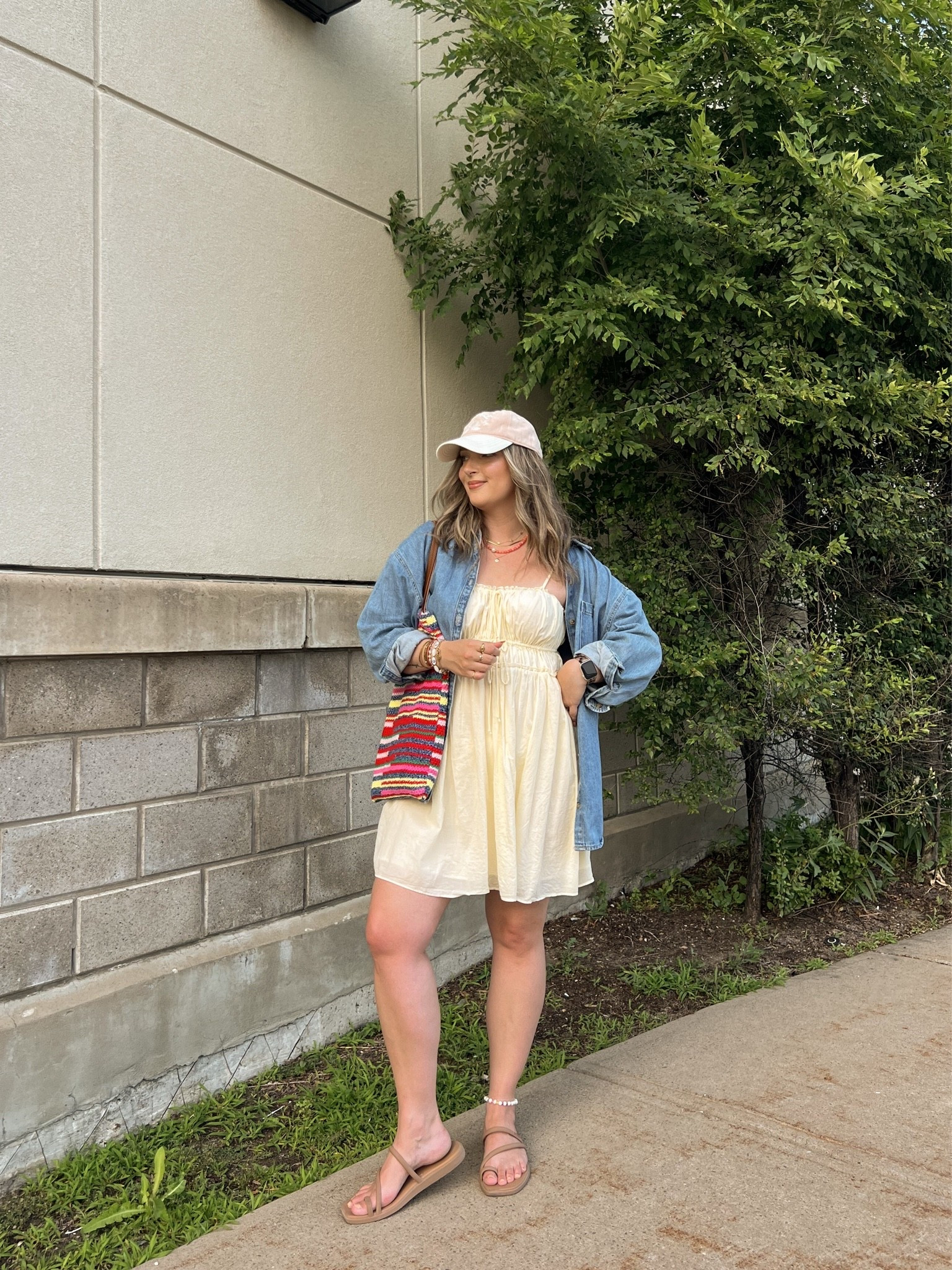 Easy summer outfit! My butter yellow dress is old from aerie, but I linked a super similar option! Wearing my usual size L in the denim shirt. Crocs sandals are super comfy, I’m a 9.5-10 shoe and wear a 10. Canadian shirt, sandals, and bag links are under “similar products”

#LTKsummer #LTKdresses #LTKmidsize