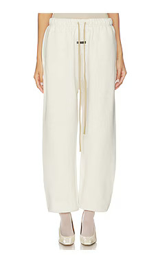Fear of God ESSENTIALS Classic Sweatpant in Oatmeal Heather from Revolve.com | Revolve Clothing (Global)