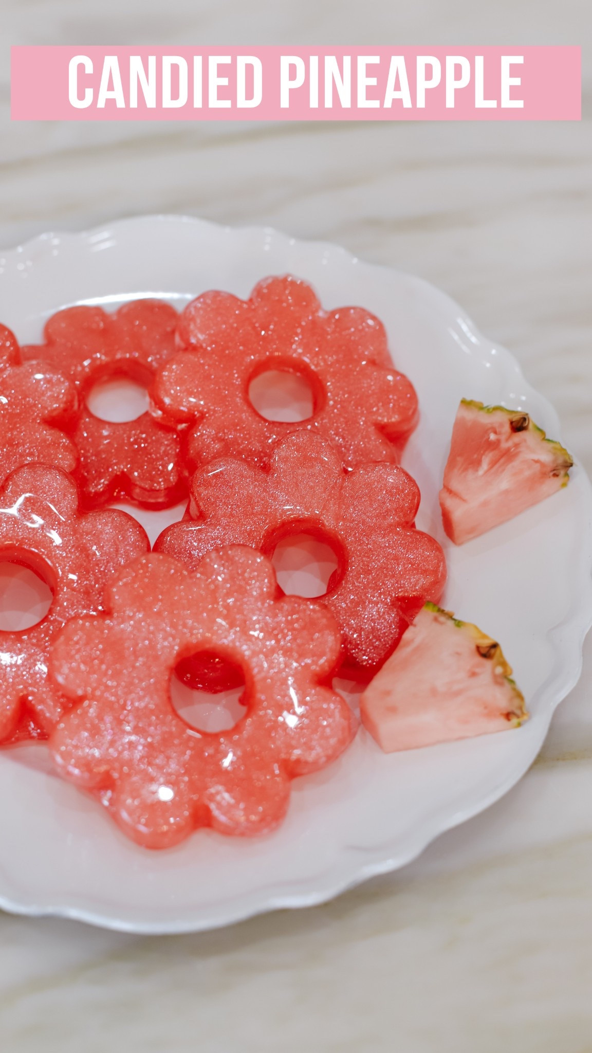 Impress your guests this Easter with Candied @pinkglowpineapple! 💗🌸💕 See FULL RECIPE below! #ad #PinkglowPineapple 

INGREDIENTS:
- Pinkglow® Pineapple
- 2 cups sugar
- ½ cup water
- ½ cup karo syrup 

Cut pineapple into any shape you’d like and blot excess juice with paper towel. Be sure to blot as much juice as possible otherwise candy will not stick. Freeze pineapple slices for 4+ hours or overnight. Boil sugar, water, and karo syrup for about 10 minutes until mixture is 300 degrees. You will want a candy thermometer to check temperature. Remove from heat immediately. Add food coloring, edible glitter, or even flavoring (optional). Dip frozen pineapple quickly (within 5 minutes) and place on parchment paper to harden. Enjoy immediately or same day. Store in freezer to ensure juices remain inside candied shell. Since the pineapple is juicy, the candied shell leak juices if not stored in freezer.

@delmontefresh @tropicalfruitboxusa @melissasproduce #DelMonteFreshProduce #FreshDelMonte #pinkpineapple #EasterRecipe #dessertrecipes #candiedfruit #easterideas 

#LTKHome #LTKParties #LTKSeasonal