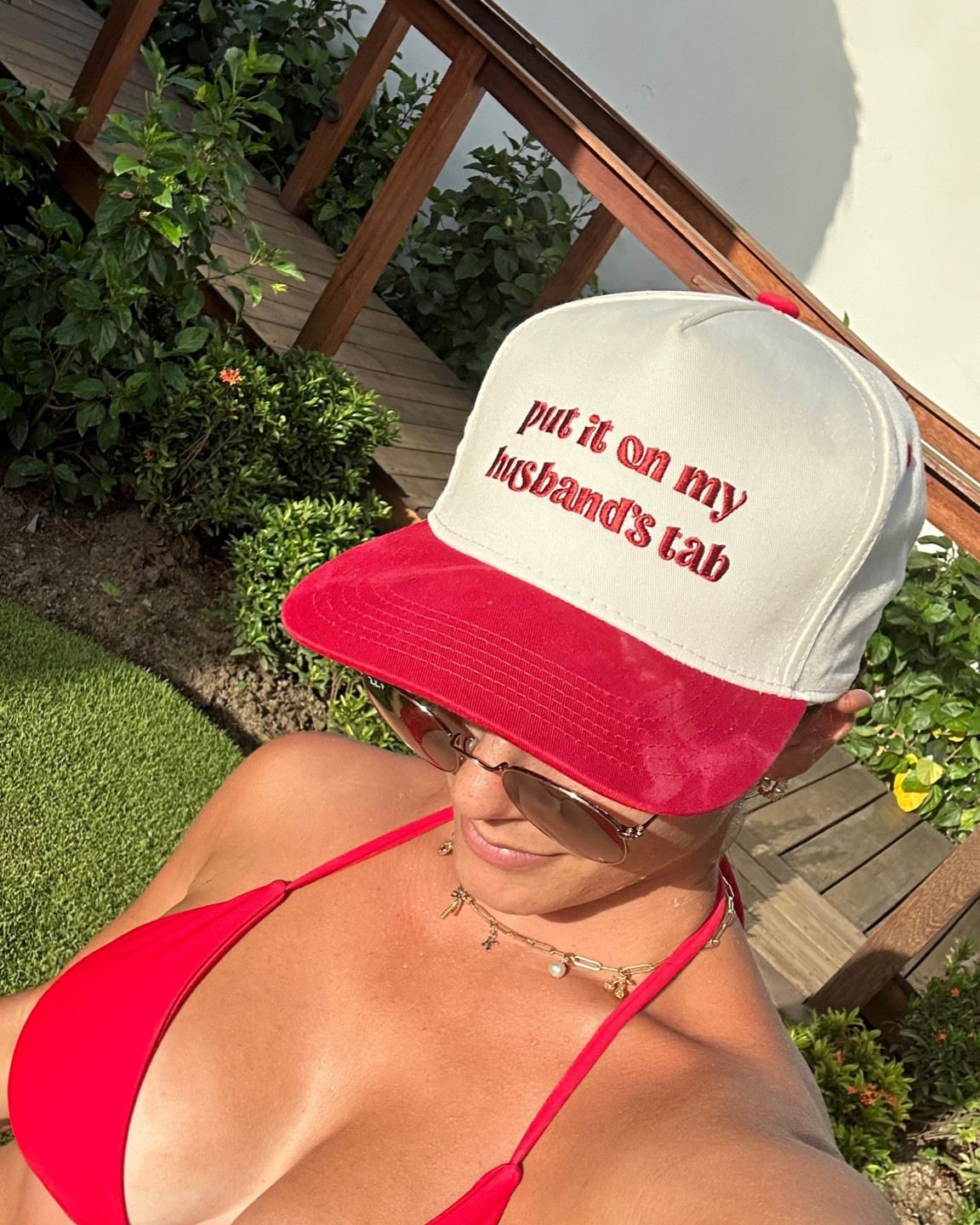 put it on my husbands tab red trucker hat | bride to be, husband and wife, honeymoon outfit, trucker hat style 

#LTKStyleTip #LTKWedding #LTKFindsUnder50