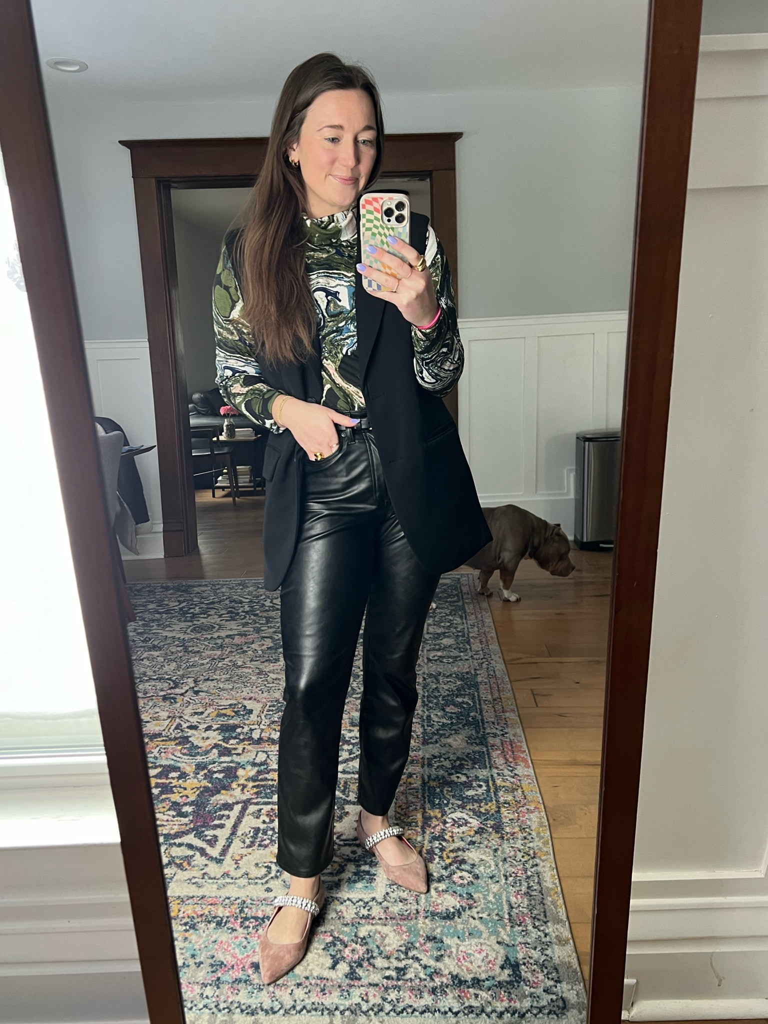 2024 style goal = wear everything in my closet. Todays outfit pairs Gap leather pants with an oversized vest, a hand me down turtleneck and an embellished flat!