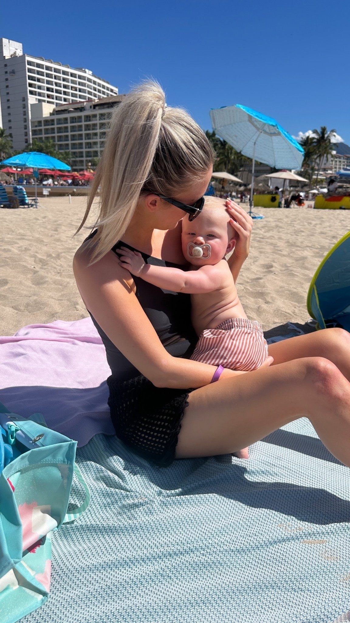 Beach snuggles 🥰 

#LTKmomlife #LTKKids #LTKBaby