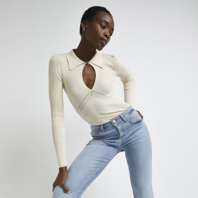 Cream cut out ribbed knit top | River Island (UK & IE)