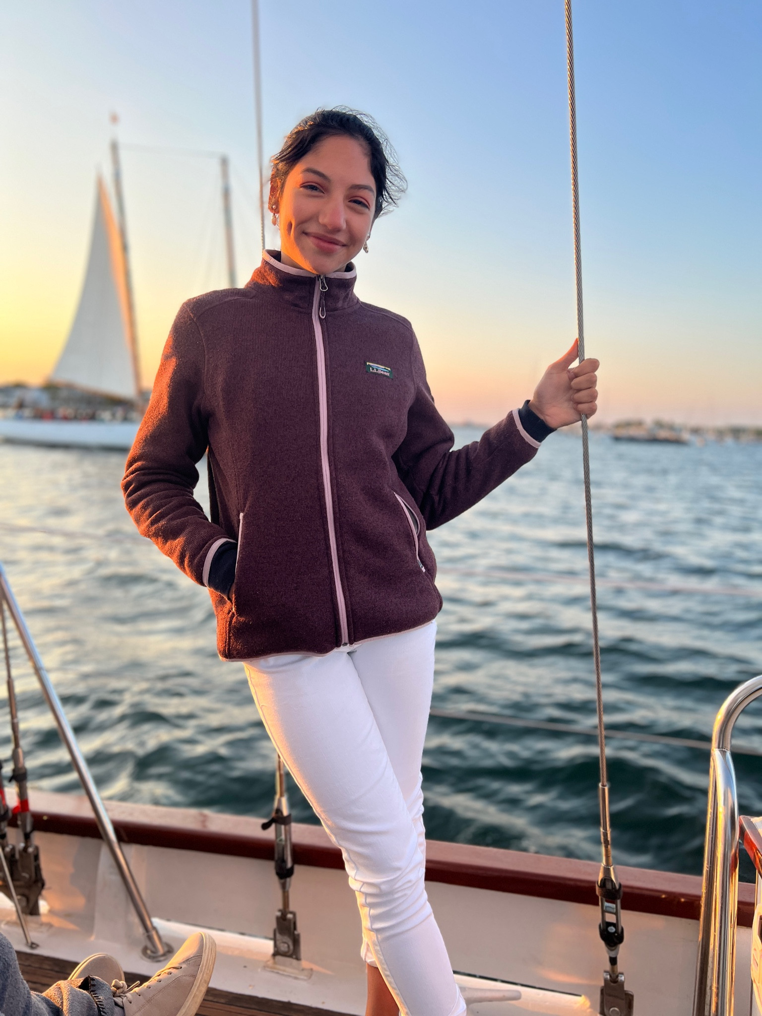 Teen summer sailing outfit. Coastal style. LLBean sweater fleece jacket. GAP white skinny jeans. 

#LTKtravel #LTKstyletip #LTKSeasonal