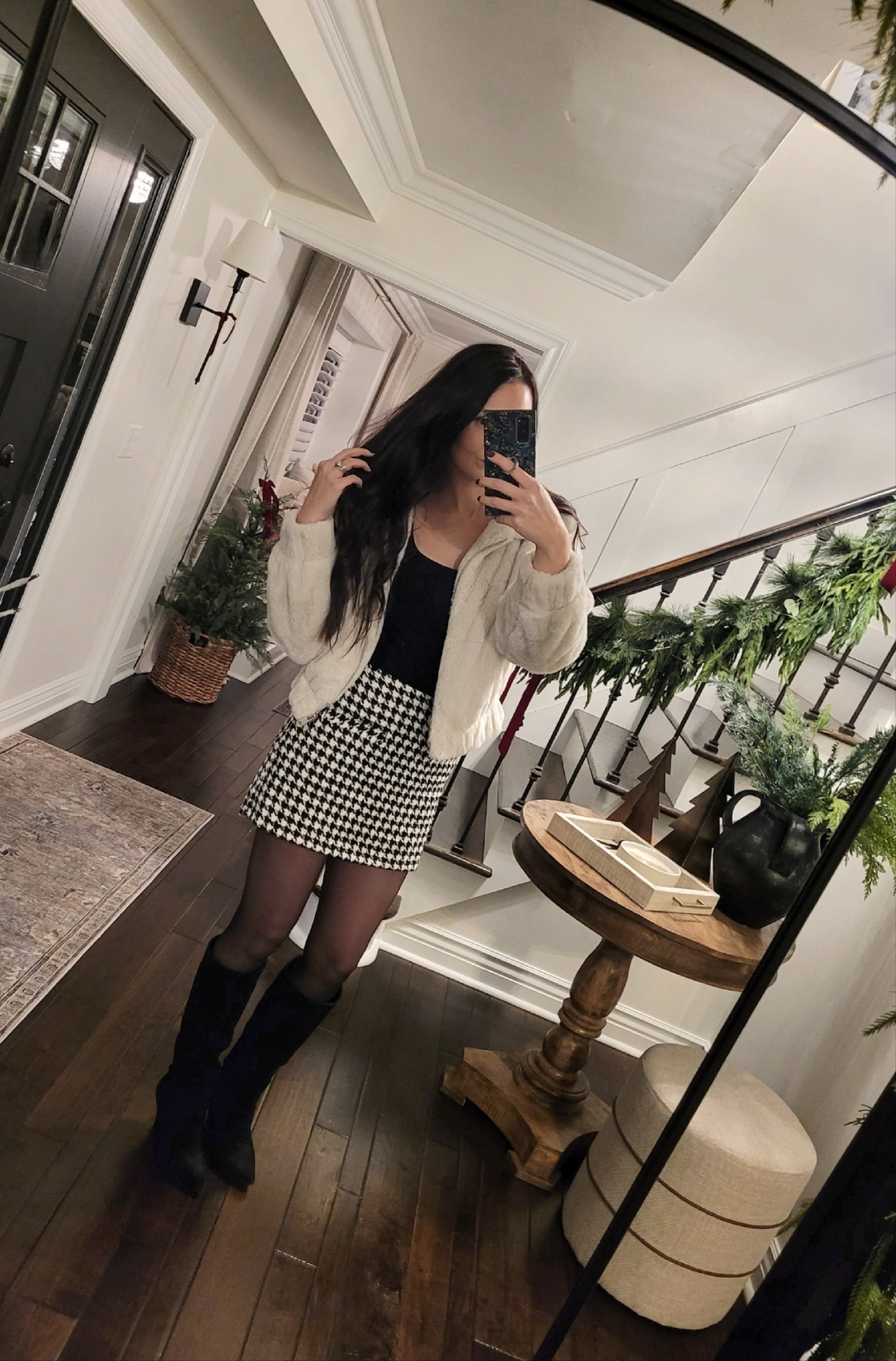 Styling a cozy cream faux fur jacket with a classic houndstooth mini skirt, sheer tights, and black knee-high boots. Perfect for holiday parties, Christmas, Thanksgiving, winter date night outfit or festive gatherings.

#LTKHoliday