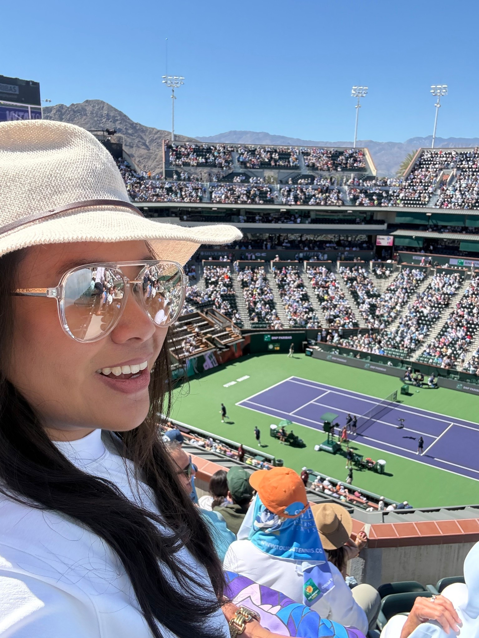 BNP Paribas Indian Wells Outfit Idea

Sharing what I wore for a sunny day at the tennis in Indian Wells. I love an outfit that feels effortless but still a little elevated for a full day walking the grounds and watching matches.

My base piece was a white tee dress from lululemon. It is one of those easy staples that always works because the waist is slightly cinched so it still feels flattering and feminine while staying comfortable for a full day out.

To elevate the look a bit I added a tan hat which gave the outfit a polished, sun ready feel. Platform reebok sneakers added some height while still being practical for all the walking around the tournament.

Accessories made the outfit feel playful and girly. I wore citrine drop hoop earrings which add the prettiest warm glow against neutral tones, along with clear frame aviator sunglasses that felt fresh and sporty for a bright desert day.

Easy, sporty, and a little elevated for a day at the BNP Paribas Open.

#bnpparibasopen #indianwellstennis #tennisoutfit #tennisstyle #lululemonstyle #teedress #sportyoutfit #athleisurestyle #platformsneakers #springtennisstyle

bnpparibas open outfit | indian wells tennis outfit | tennis tournament outfit ideas | lululemon tee dress outfit | sporty chic outfit | tennis spectator style | athleisure outfit ideas | platform reebok sneakers outfit | clear aviator sunglasses outfit | spring tennis fashion | desert tennis style

#LTKootd #LTKdayinmylife #LTKActive