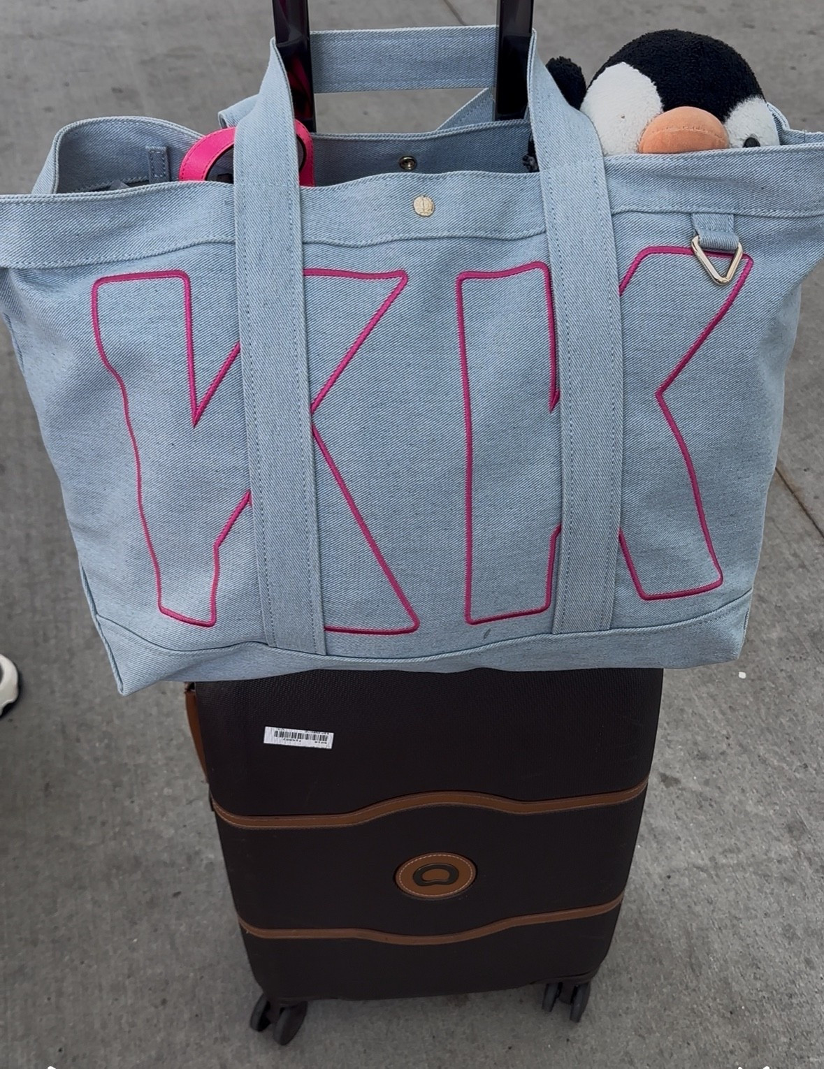 The perfect travel tote available in 3 sizes: small, medium and large. This is the large and fits all or my carry-on items plus my son’s. As seen in blue denim and hot pink 💕 font.

#LTKTravel