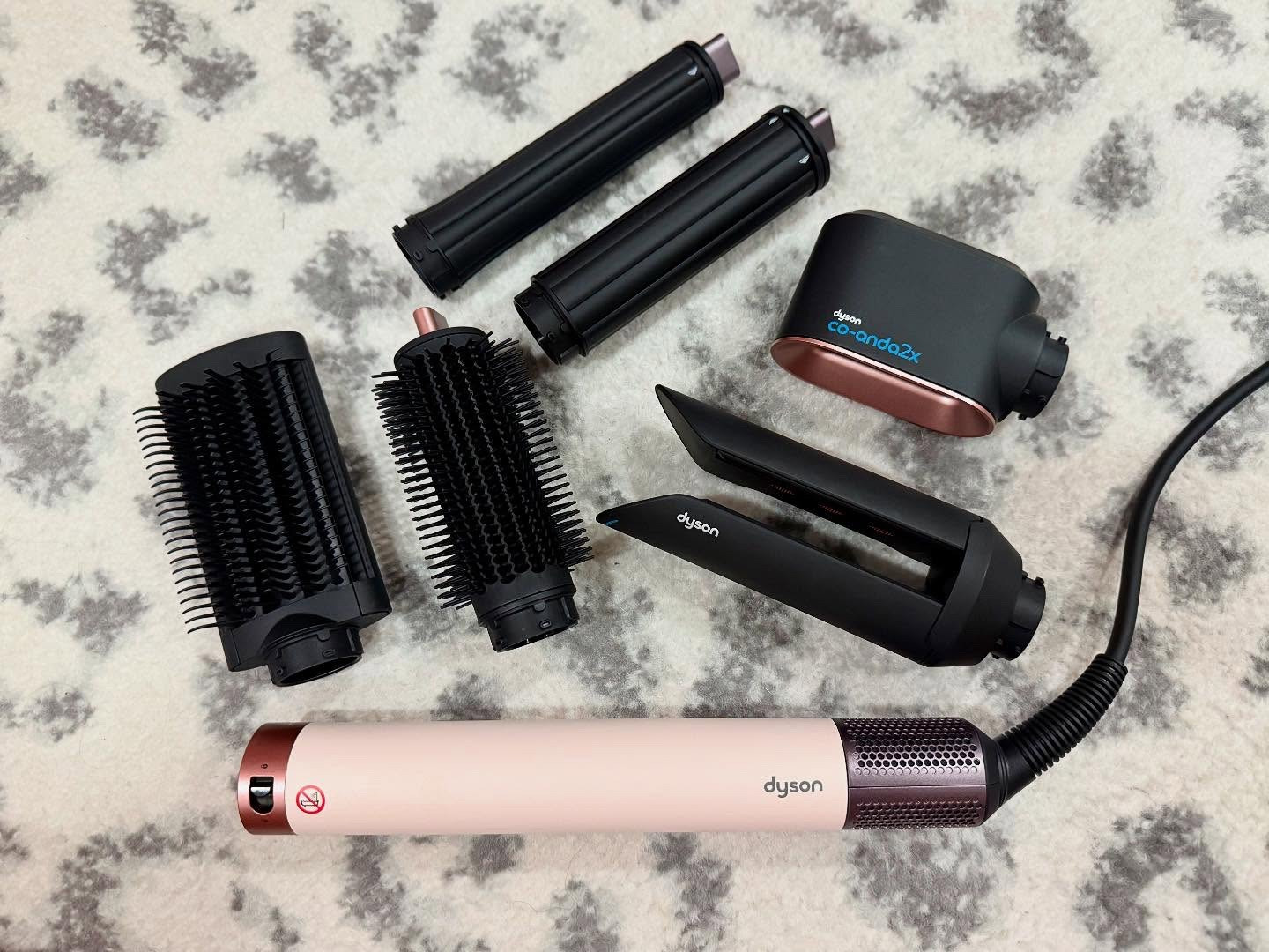 ⭐️PRODUCT REVIEW⭐️

This product was gifted to me by @dysonbeauty and @skeepers_us in exchange for my honest review.

The Dyson Airwrap Co-anda2x is everything I hoped for and more. I am seriously so impressed. The Straight/Wavy version of the Airwrap comes with 6 attachments that give you the ability to dry, curl, wave, straighten, smooth and volumize. Just using this as a hairdryer it dries my hair faster than any tool I’ve ever used - it’s 30% more powerful than the Airwrap i.d. The Airsmooth2x finishing attachment is the newest addition to this airwrap tool and is really neat. It used on dry hair to straighten your hair with just air. There are 2 different size multi-directional curling barrels. I will say curling took some practice but I think I’m finally getting the hang of it. You can set up your hair profile and i.d. curl in the app and it makes it easier than ever - it will automatically run the cycle of wrapping, styling and cooling then once the cycle is complete the air flow shuts off to release your curl. The Round Volumizing Brush 2x attachment is great for providing volume at the root and achieving that classic blowout look. The Anti-snag loop brush 2x attachment has been redesigned with loop bristles to reduce snagging and provide a smoother finish. This all comes in a beautiful storage case that fits your Airwrap and all of its attachments. Overall I am so impressed and this has become a staple in my daily routine. I don’t know how I ever managed my hair without it!

#complimentary #gifted #free #freeproduct #productreview #dyson #dysonairwrap #skeepers #ugc #ugccreator