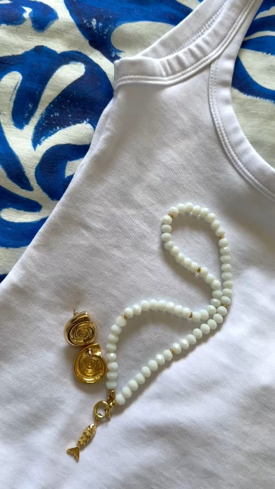 White bodysuit, printed midi skirt, matching shirt and shorts, gold seashell accessories… Setting up the stage for the weekend 

#LTKOver40 #LTKSaleAlert #LTKTravel