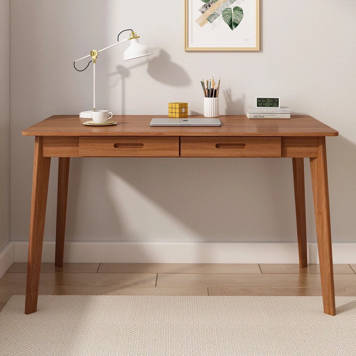 This mid century modern wooden desk from Wayfair is such a clean and timeless workspace find. The warm wood finish, tapered legs, and built-in drawers give it that classic Scandinavian-inspired look while still feeling practical for everyday use. Perfect for home offices, bedroom workspaces, studying, or apartment setups. Love the minimalist design for creating a calm and organized workspace. Plus, it’s currently part of the Wayfair Memorial Day Deal event.

#LTKHome #LTKSaleAlert