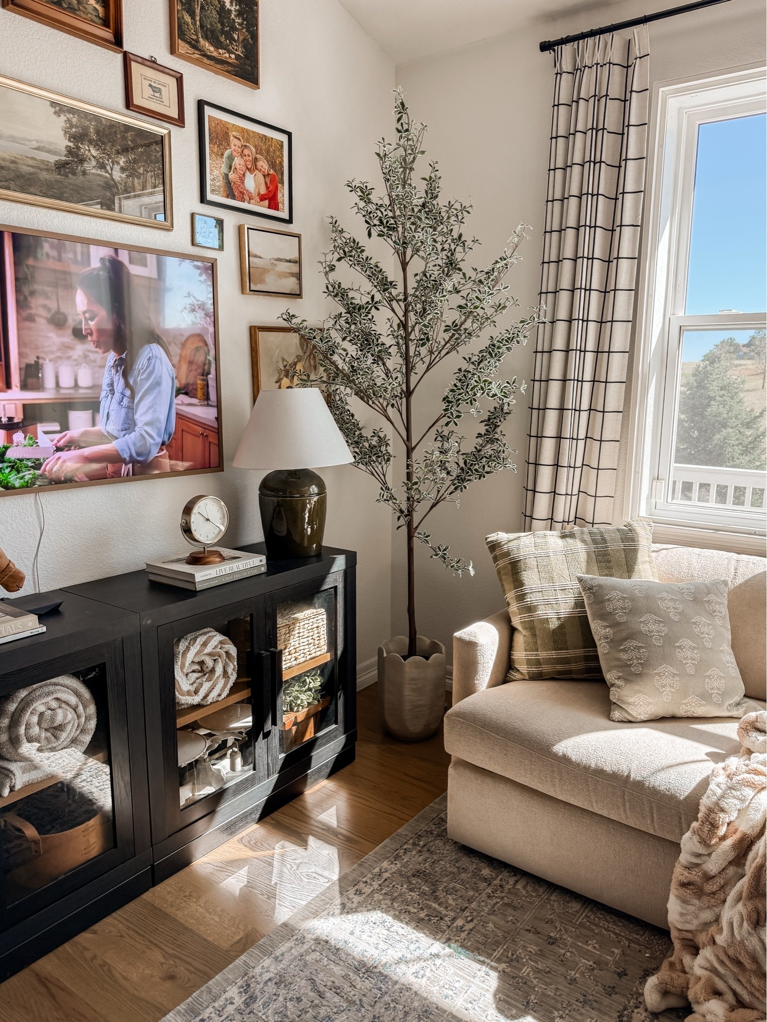 Faux tree from Target! Living room
decor linked.

#LTKSaleAlert #LTKHome #LTKSeasonal