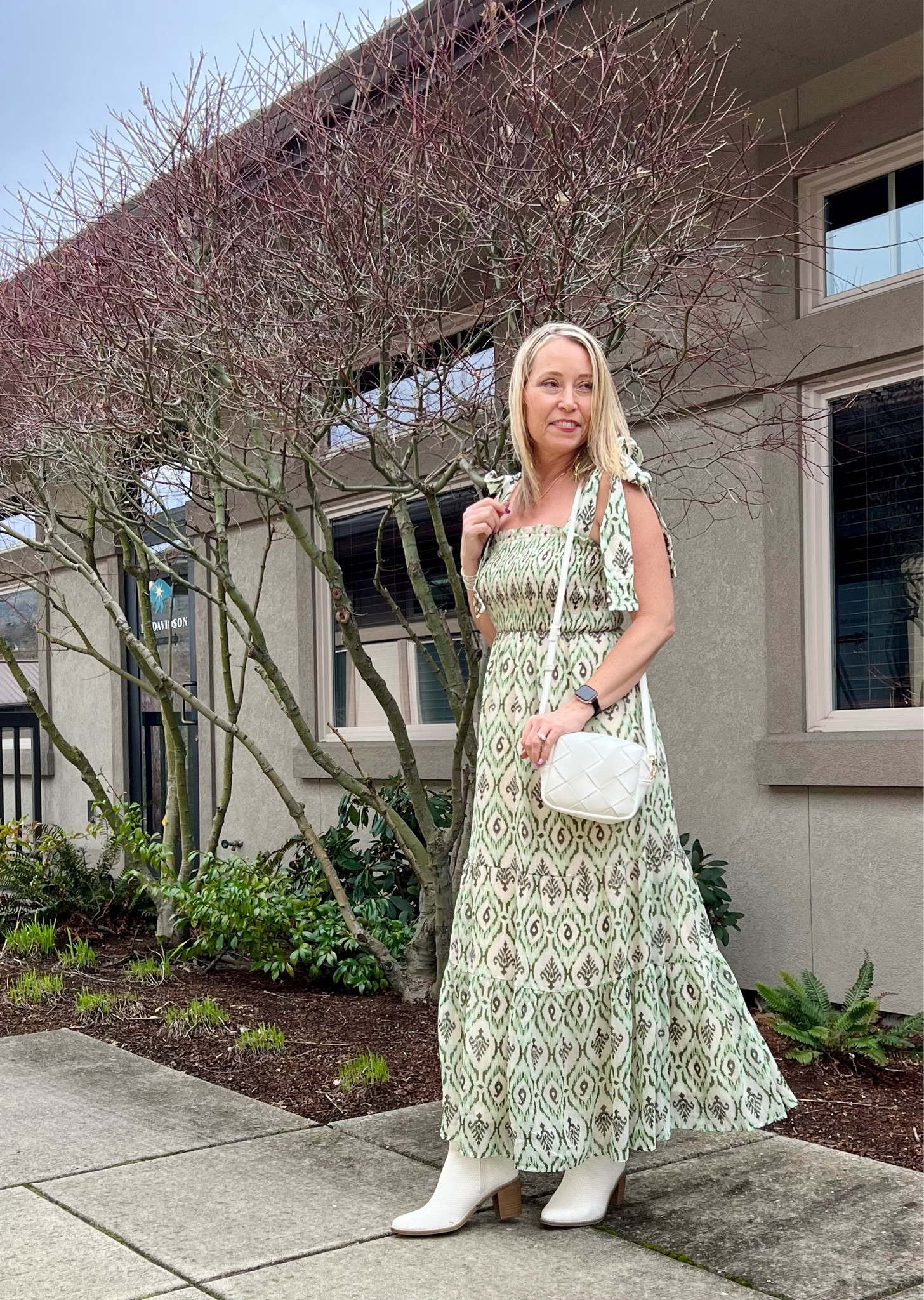 Such a gorgeous and feminine spring maxi dress! Love the green print and subtle gold thread. Check out the grommet details on the ties too! Add a denim jacket for that perfect spring dress formula!

Use code STYLESMITTEN for 15% off this dress and denim jacket or anything else site wide at Avara  

#LTKover40 #LTKSpringSale #LTKwedding