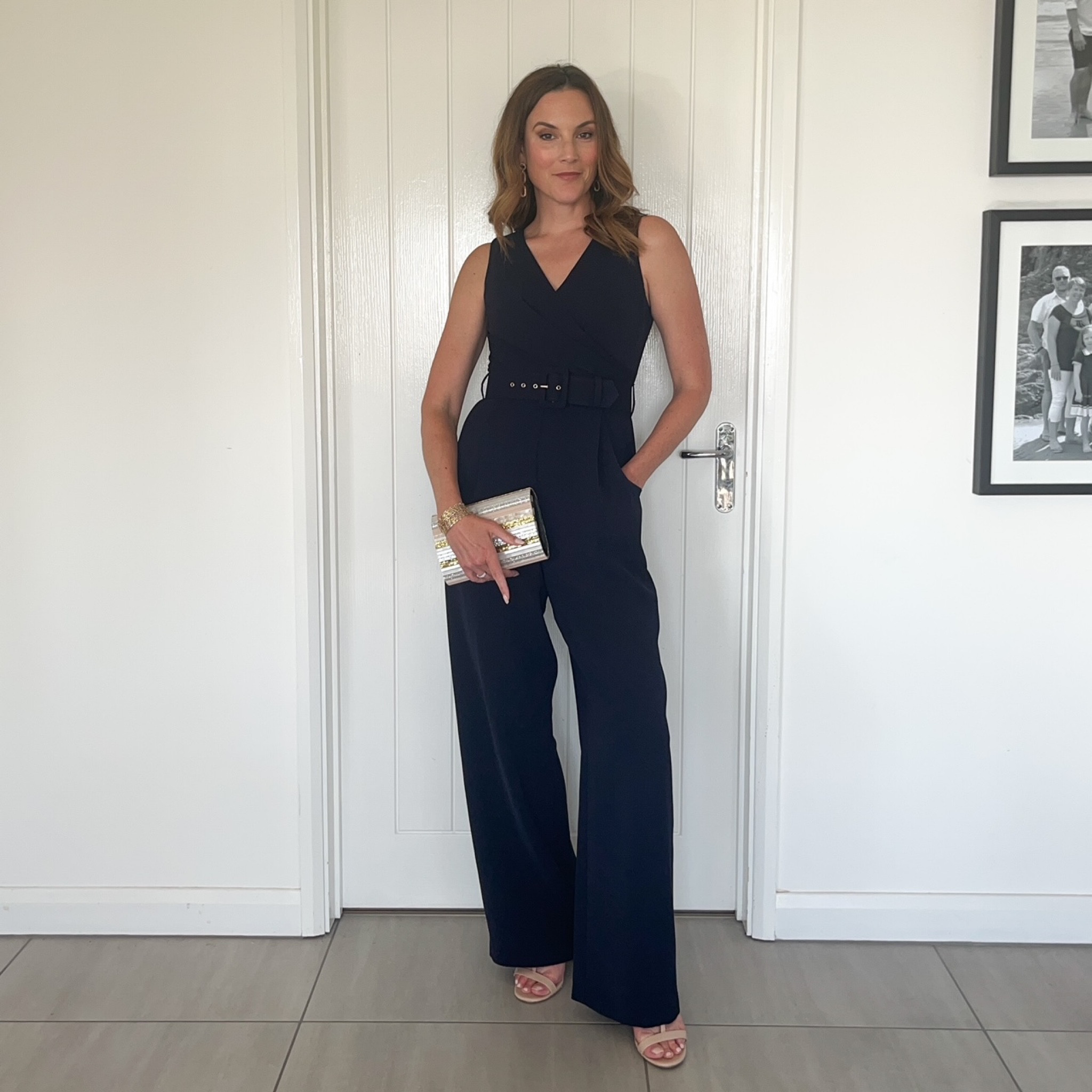 Navy jumpsuit, metallic clutch bag, nude block heel sandals, lace cuff, pearl gold chain drop earrings 

#LTKstyletip #LTKeurope #LTKSeasonal
