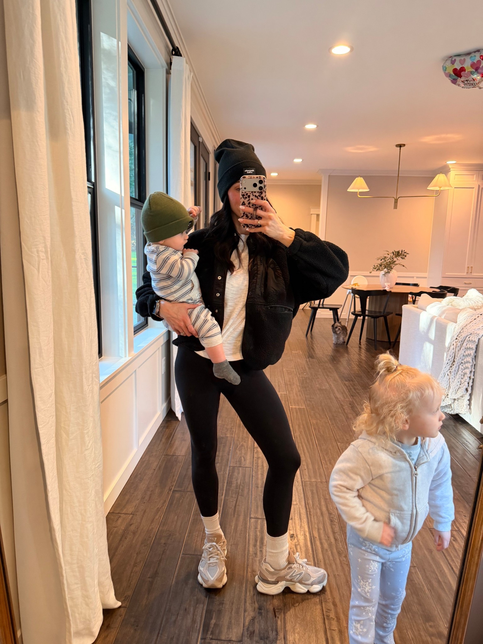 Getting out for a walk wearing the ultimate mom uniform. New balances, leggings, a white tee & Amazon fleecee

#LTKActive #LTKootd #LTKmomlife