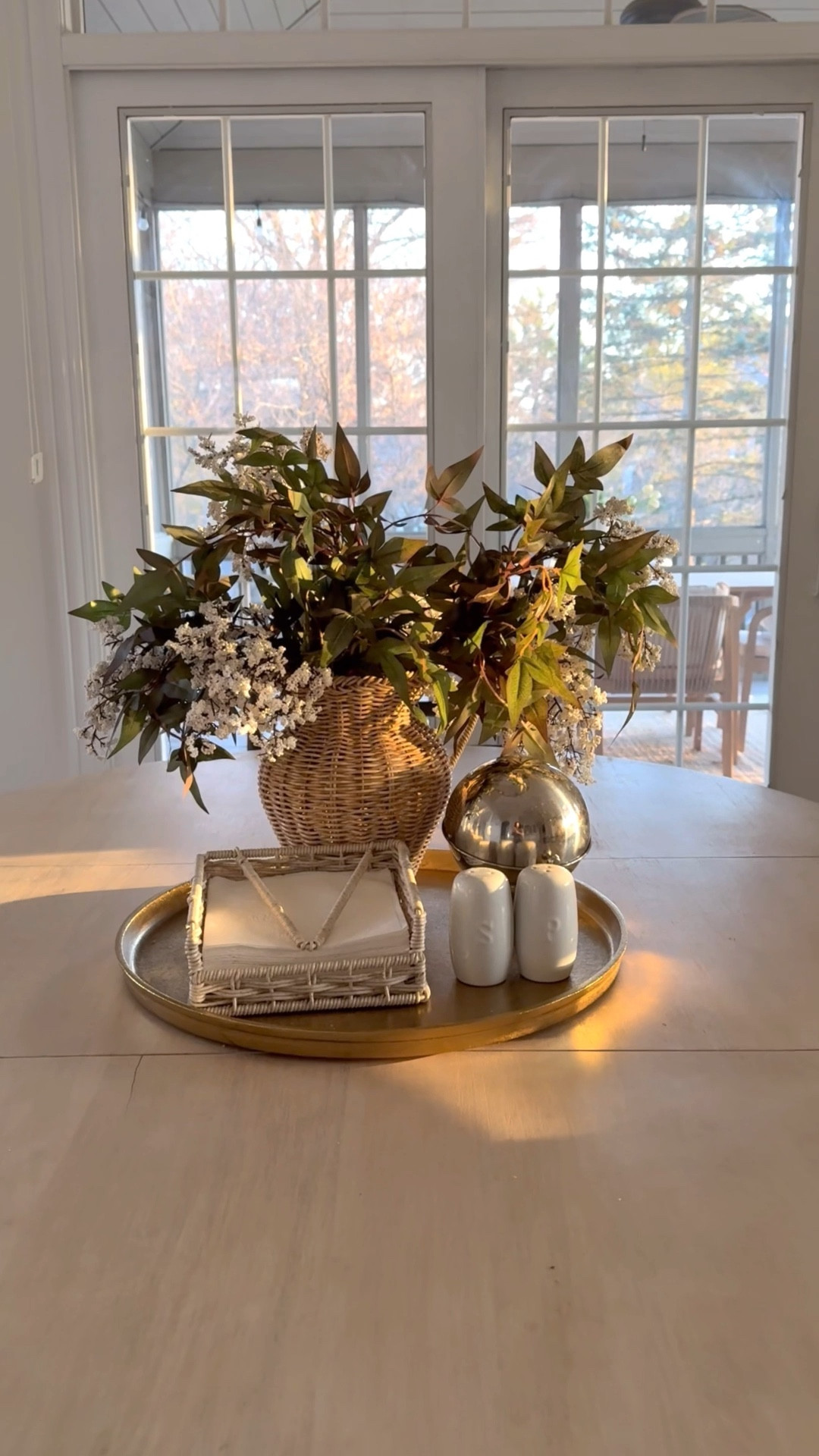 Kitchen table setup! ✨🫶🏼

+ tray
+ woven vase from Walmart 
+ faux flowers from Amazon
+ napkin holder from Home Goods
+ salt and pepper shakers
+ nut or candy container from Amazon 

All saved on my LTK! 

#LTKHome