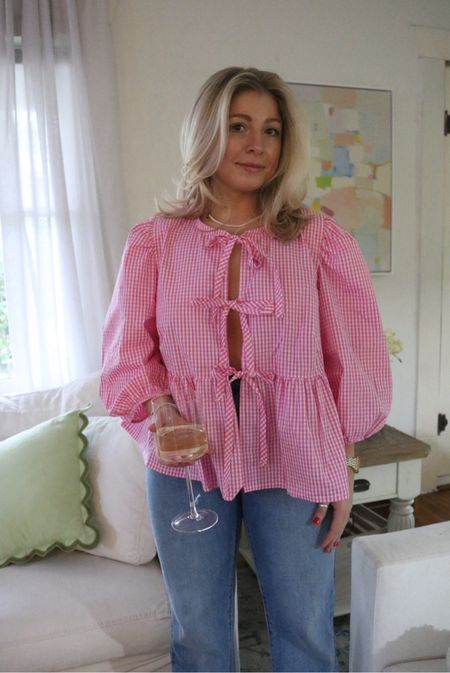 Pink Gingham Blouse under $30 fits Oversized wearing a medium 

#LTKSeasonal #LTKStyleTip #LTKFindsUnder50