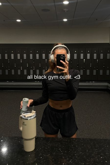 my favorite way to go to the gym: all black workout outfit 🖤🐈‍⬛🎧  

this long sleeve top is my favorrrite for low-impact workout days. 

the shorts are also a favorite — usually this style of shorts doesn’t fit my 🍑 right 😂 but these fit like a glove and cover everything that needs to be covered! <3  

➡️ linking all of the colors because you need these!! 

❣️ both are alo yoga & everything is TTS (I’m size small) 

|| Gym outfit, workout set, black gym shorts, long sleeve gym top, long sleeve workout top, cropped workout top, workout outfit 

#LTKfit #LTKstyletip #LTKFind