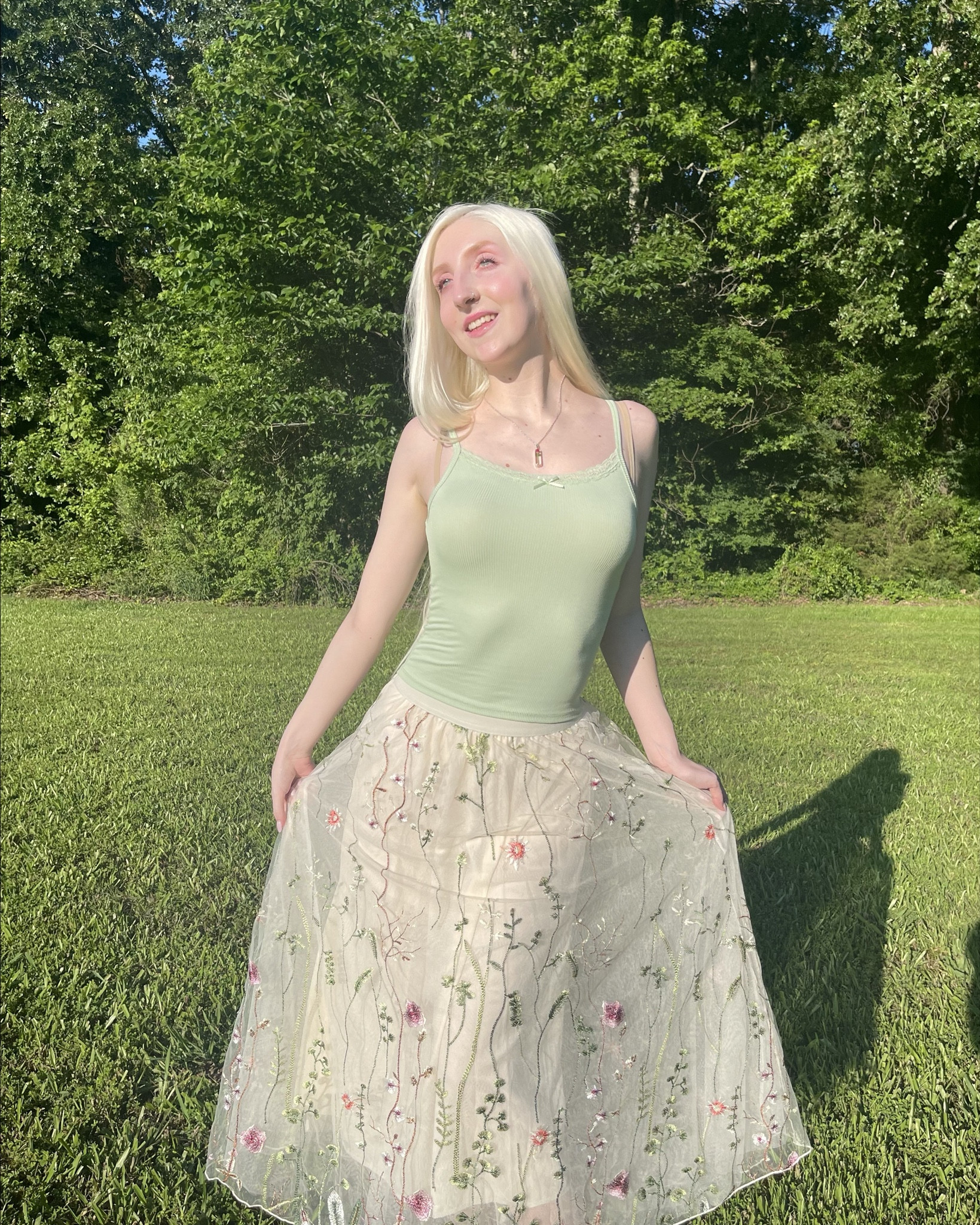 Wearing a beautiful floral embroidered skirt from Rihoas! You can use my code: AGI20G for 20% off at Rihoas! The exact skirt is linked below! Along with a light green tank top and white boots! 

#LTKSaleAlert #LTKFindsUnder50 #LTKFindsUnder100