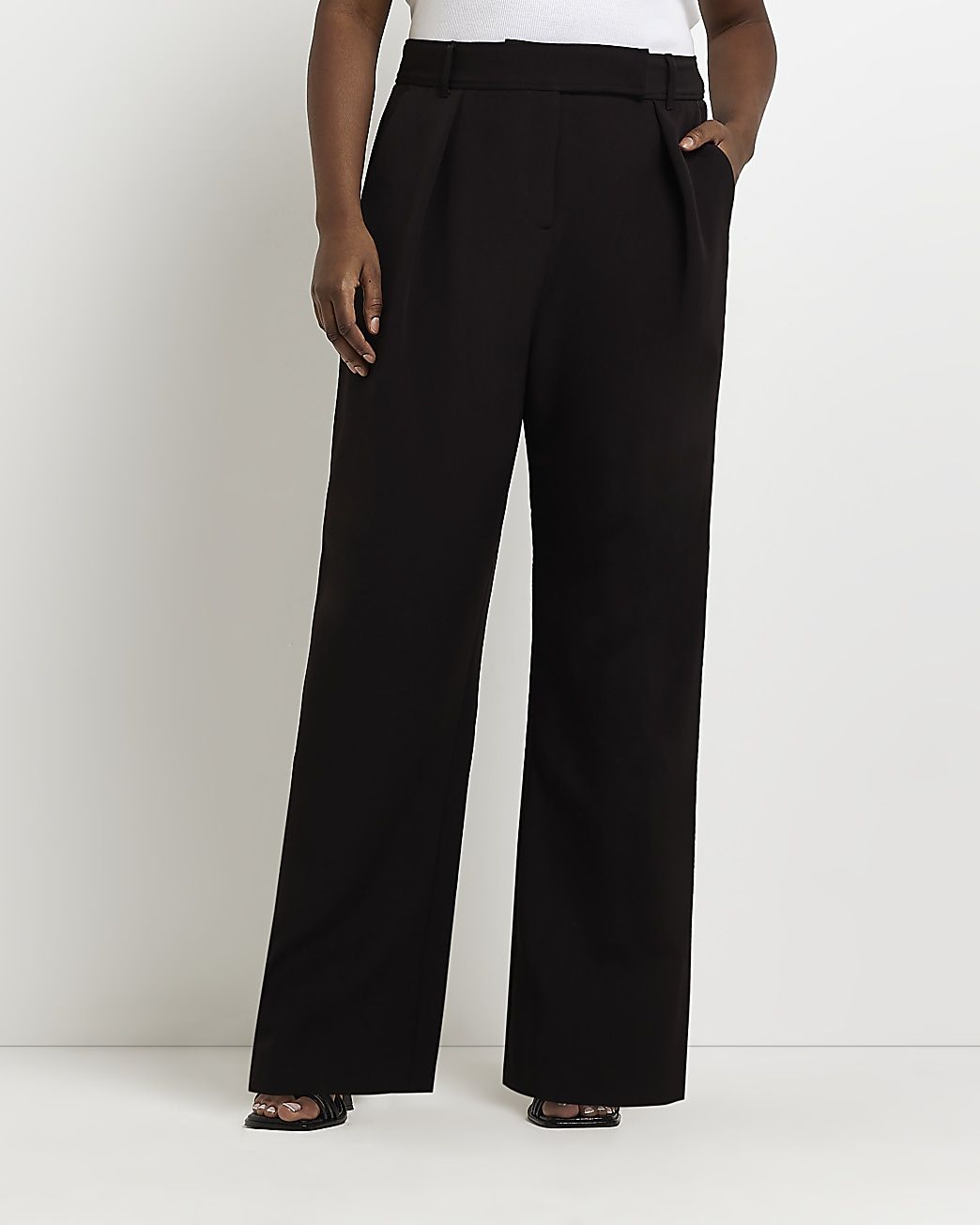 Plus black pleated wide leg trousers | River Island (UK & IE)