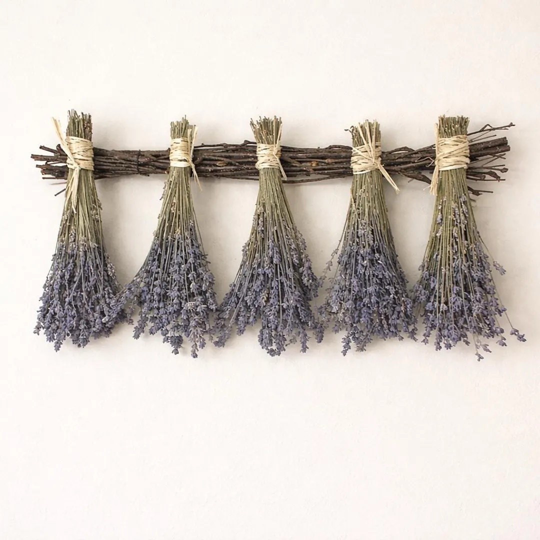 Bring a touch of rustic countryside charm into your home with this Lavender Birch Hanger 💜 A natural birch branch holds five hand-tied bundles of air-dried lavender, each wrapped in raffia for a simple, organic look. The soft dusty purple tones and gentle lavender scent make it a beautiful accent for entryways, kitchens, or bedrooms. Grown, harvested, dried, and handcrafted on a U.S. farm, every piece is naturally unique and timeless.

#ltkhome #lavenderdecor #driedflowers #farmhousedecor #cottagecore #rusticdecor #naturalliving #homedecorinspo #botanicaldecor #ltkfinds

#LTKHome #LTKSpringSale #LTKSeasonal