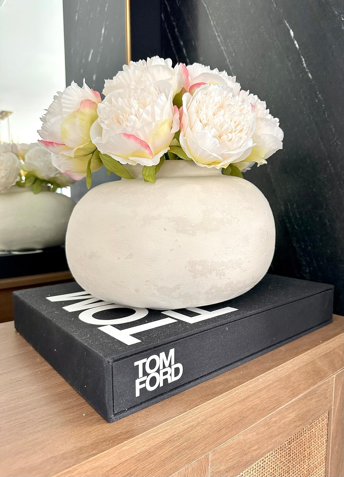 Pretty peonies! Super affordable home decor. Spring decor. Summer decor. Tom Ford coffee table book. Modern organic vase. Gold frame mirror. Cane cabinet. | Amazon (US)