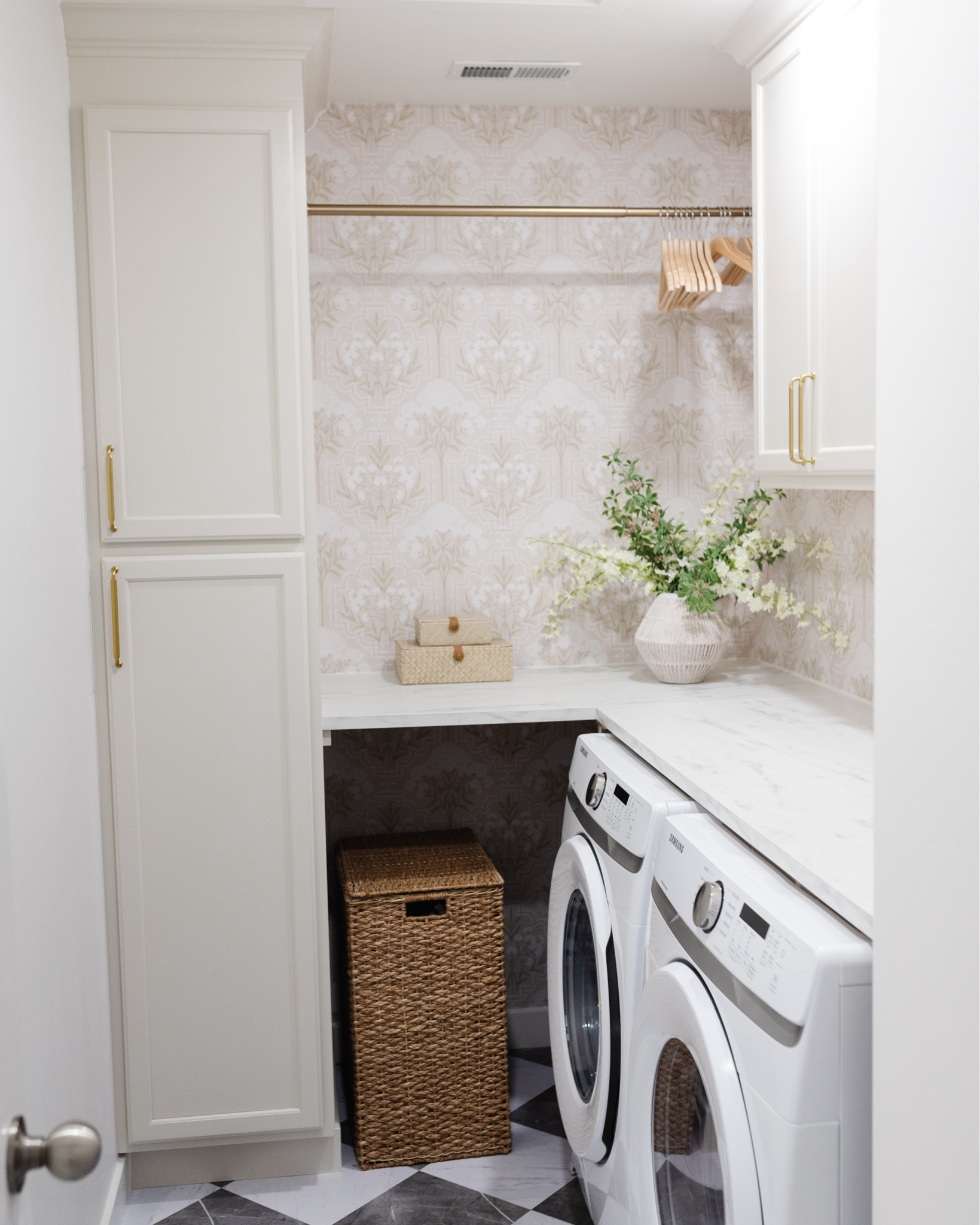 Y’all. I was on a roll and then the move hit hard 🤣 I was completely SWAMPED the last two days of our move and the next few days after that so I’ll be posting the last two rooms in our townhome today and then a reveal of our new house on Friday!! 🤪 

Day 11- Our Laundry Room- swipe for the before 👉

This was the very last room we remodeled in this home and I am a little sad that we didn’t get much time to fully enjoy it before saying goodbye 🥲 But at least our new renters will get to enjoy it! 

Wall color: Benjamin Moore Swiss Coffee @75% strength 
Cabinets: Benjamin Moore Natural Cream

To shop this post, head to my stories or click the link in my bio & choose “Shop my LTK” 

We have officially moved into our new home! Stay tuned for the last townhome room reveal tomorrow 🙌

#housebeforeandafter #homebeforeandafter #beforeandafter #traditionalcoastalhome #homedecor 

#LTKFindsUnder50 #LTKFindsUnder100 #LTKHome
