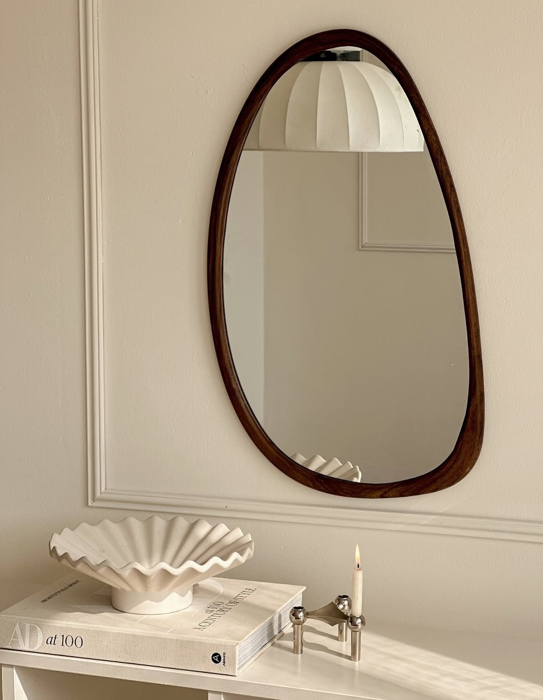Soft light, organic curves, and timeless neutrals — this little corner makes me slow down and breathe a little deeper 🤍 The mirror’s natural wood frame brings warmth, while the ruffled ceramic bowl adds a sculptural moment I’m obsessed with. Styled with a classic coffee table book and my favorite candle holder, this setup feels effortlessly elegant and lived-in. It’s all about layering texture, balance, and personality into your home. Everything you see here is linked on my LTK so you can recreate the look ✨ Tap the link in bio to shop these finds! #NeutralDecor #SculpturalStyle #InteriorInspo #OrganicModern #HomeVibes #CozyCorner #MinimalStyle #LTKFinds

#LTKActive #LTKSeasonal #LTKHome