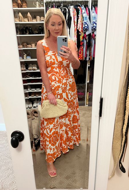 Orange floral print maxi dress perfect for summer vacation. Wearing size S. 

#LTKTravel #LTKFindsUnder100 #LTKOver40