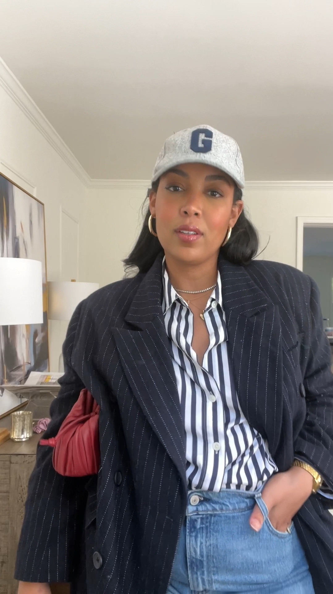 30 Outfits 30 Days: Day 5 - stripes on stripes! I can never say no to a pinstripe, honey! 🔥 Also, I grabbed this hat last minute because it rained at a football game, but I absolutely love it, and Michael and I wear it constantly 😭😂

#LTKMidsize #LTKVideo #LTKxMadewell