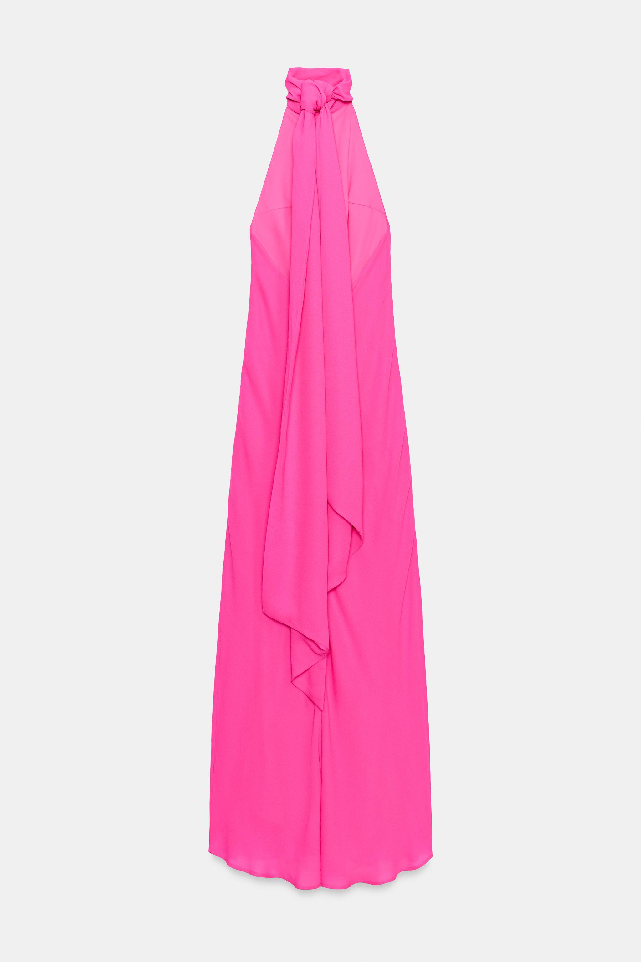 Long halterneck dress. Open back. Matching tonal lining. Tied fastening at the neck and invisible... | Zara UK