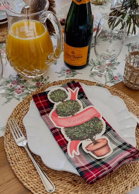 Festive Christmas breakfast table using these darling paper topiary name tags and holly runner. 

#christmasbreakfast #christmastable #christmasentertaining #christmastablesetting 

#LTKparties #LTKHoliday #LTKhome