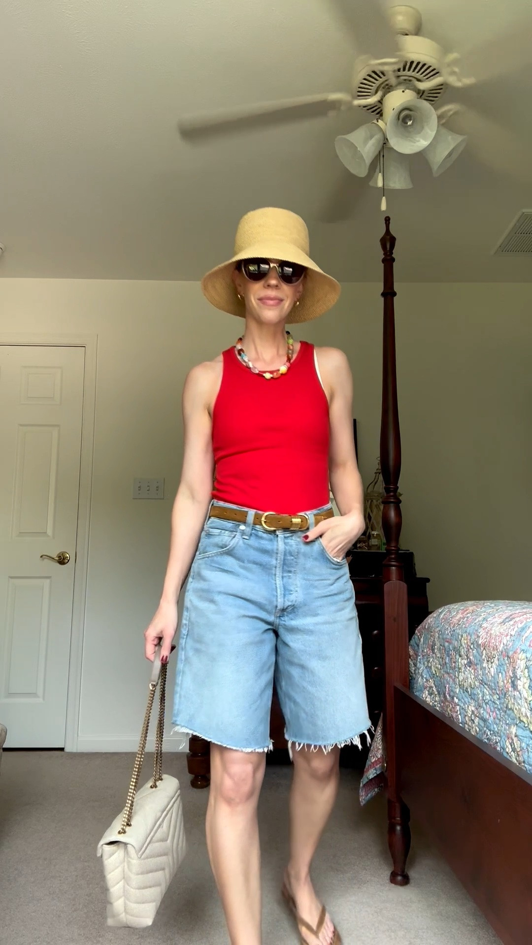 Casual summer outfits over 40, red tank top, denim bermuda shorts, @Janessa Leone straw bucket hat, beaded necklace

#LTKSeasonal #LTKOver40 #LTKSaleAlert