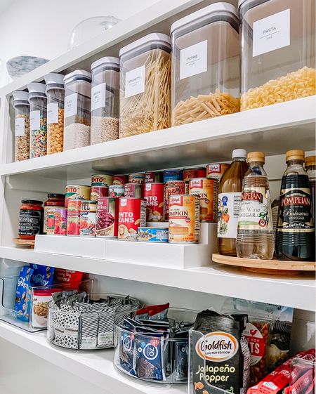 When organizing pantries, our main goal is to utilize the space as best we can to maximize storage while being mindful about keeping it useable. We're biased, but we think our organizers hit it out of the park on this one!