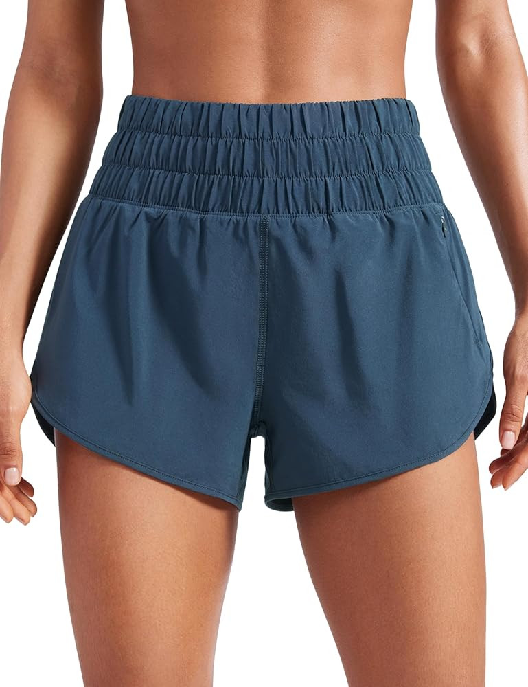 CRZ YOGA High Waisted Dolphin Running Shorts for Womens Mesh Liner Gym Workout Athletic Shorts wi... | Amazon (US)